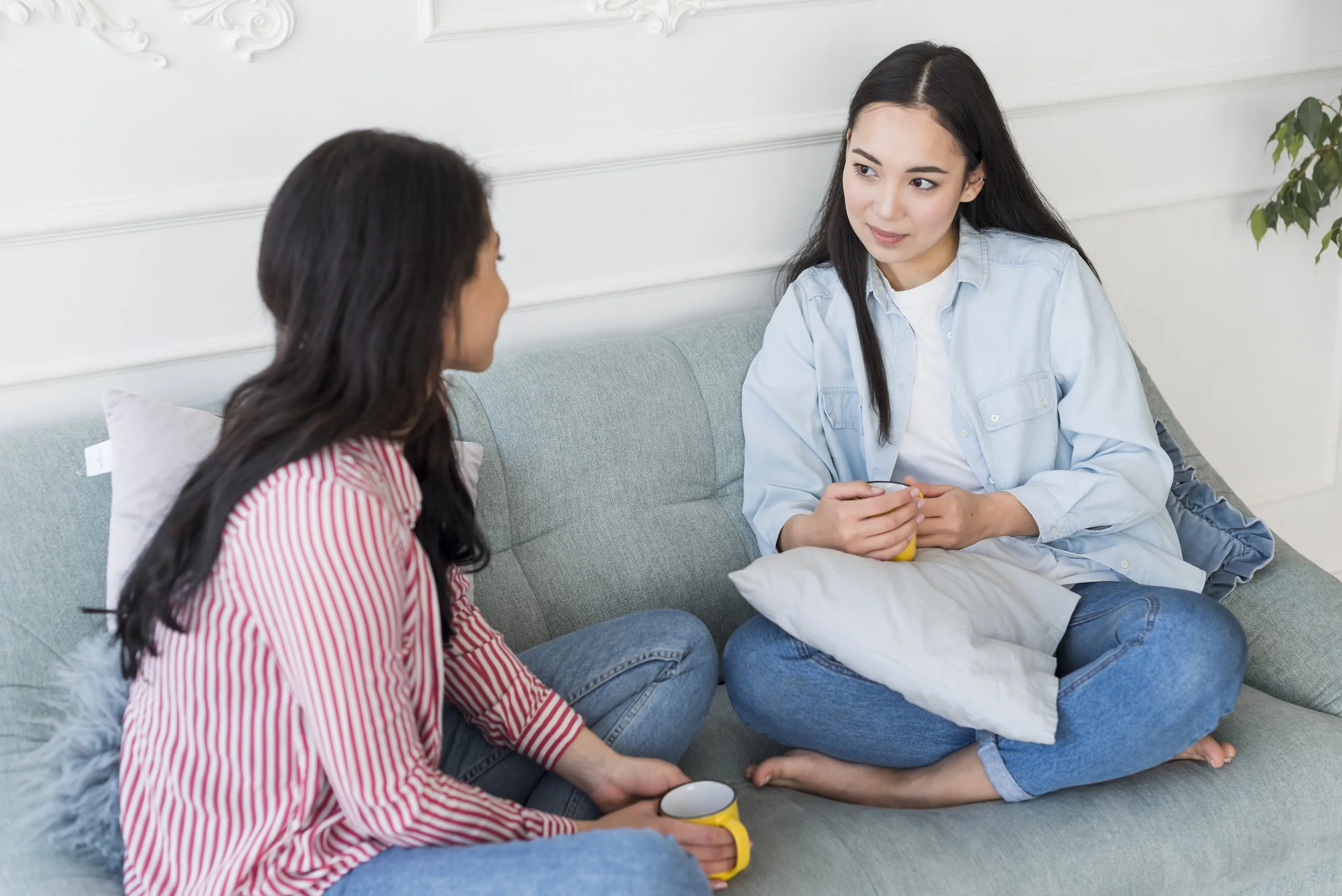 Client discussing depression and life stress with therapist during counseling session.