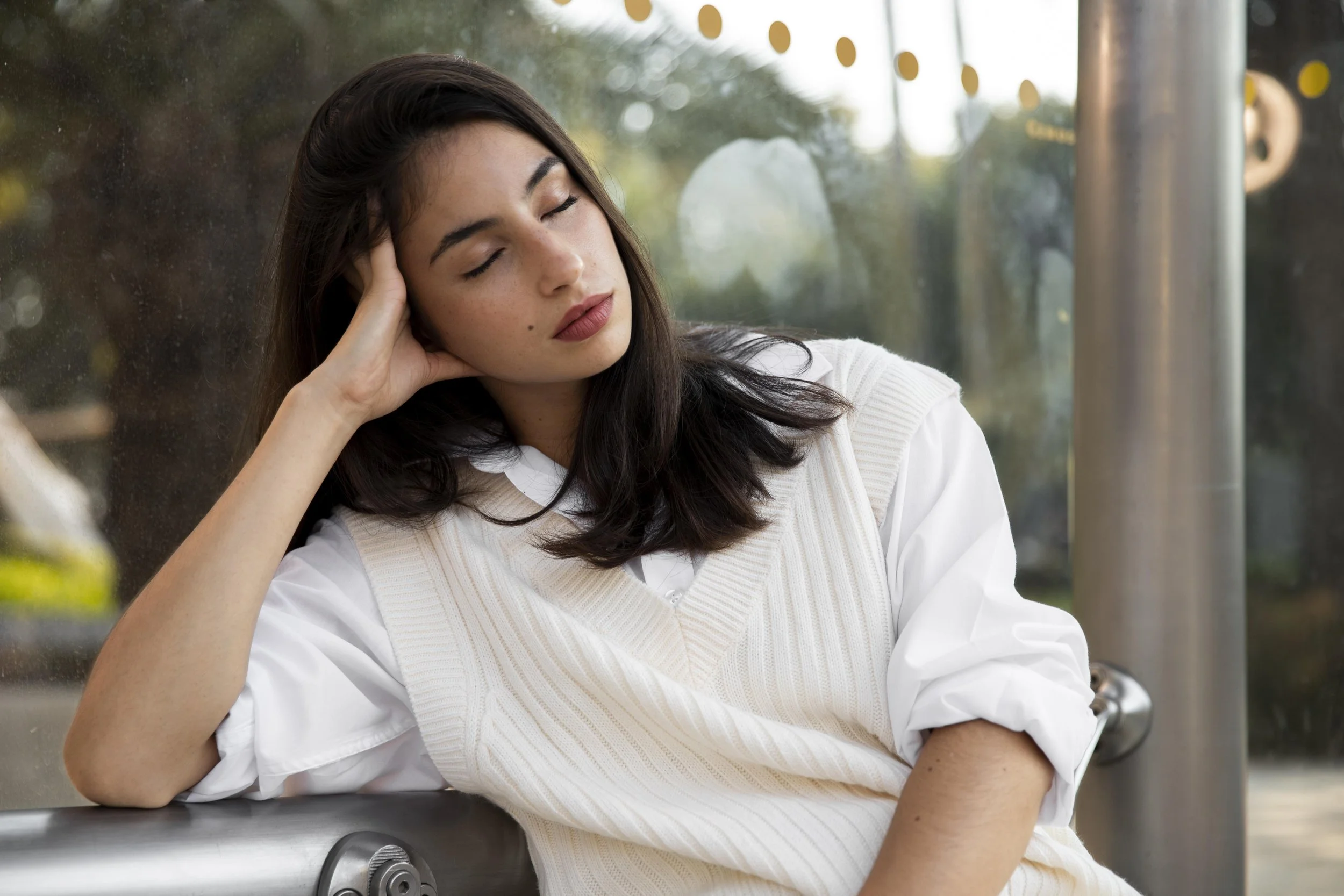 Woman looking overwhelmed by family, work, and personal responsibilities.