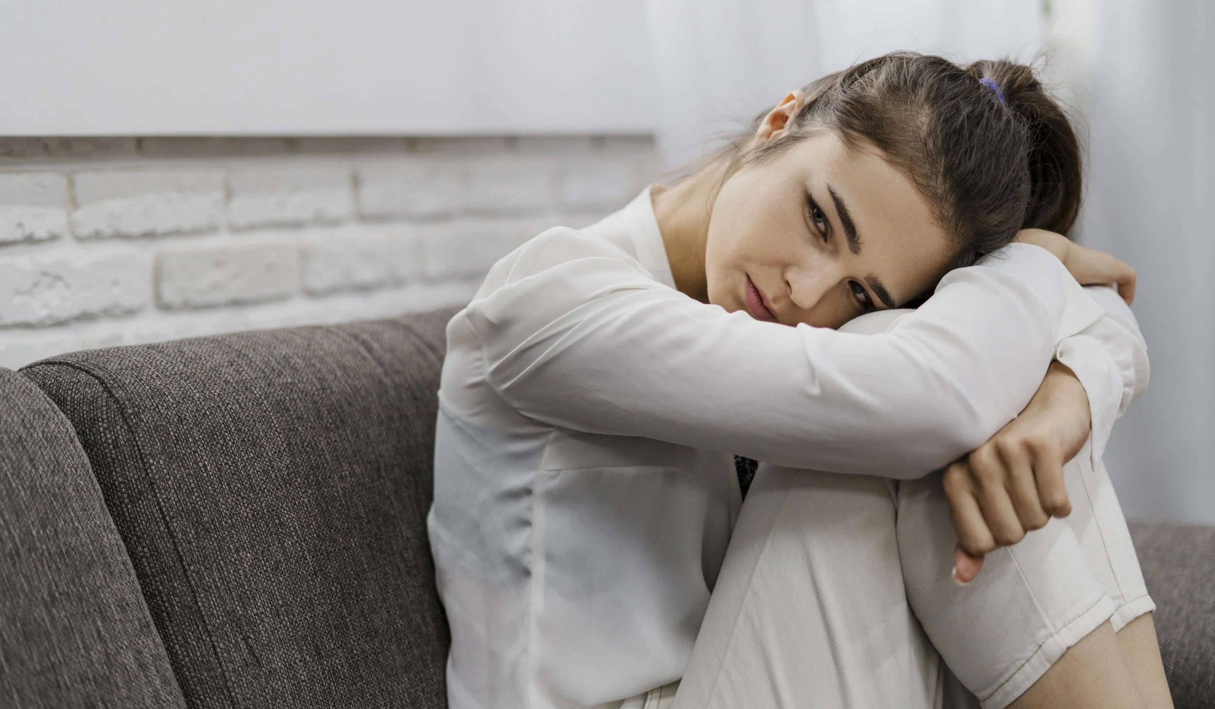 Person seeking mental health support early before stress becomes overwhelming.
