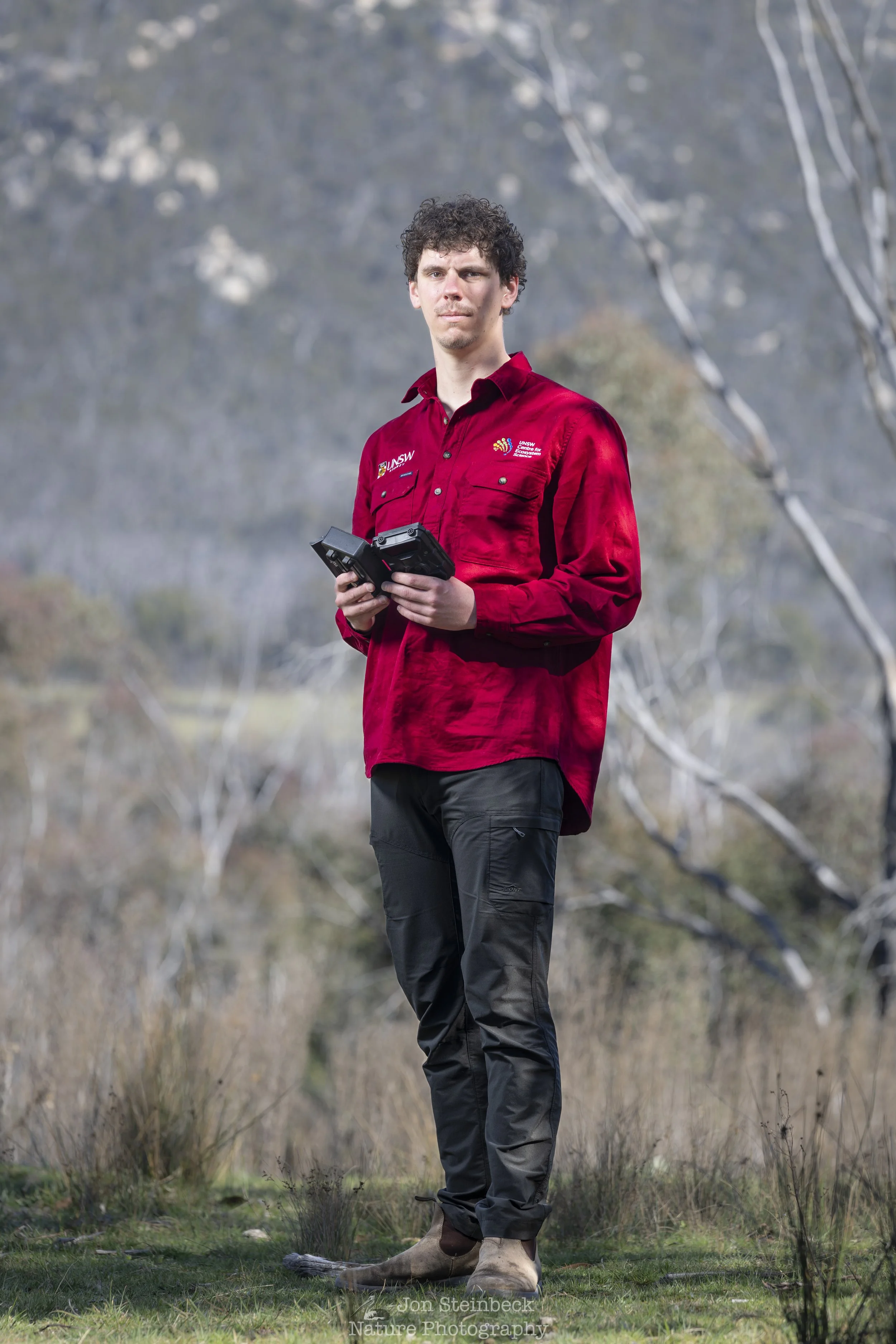 Photographing a dingo ecology researcher