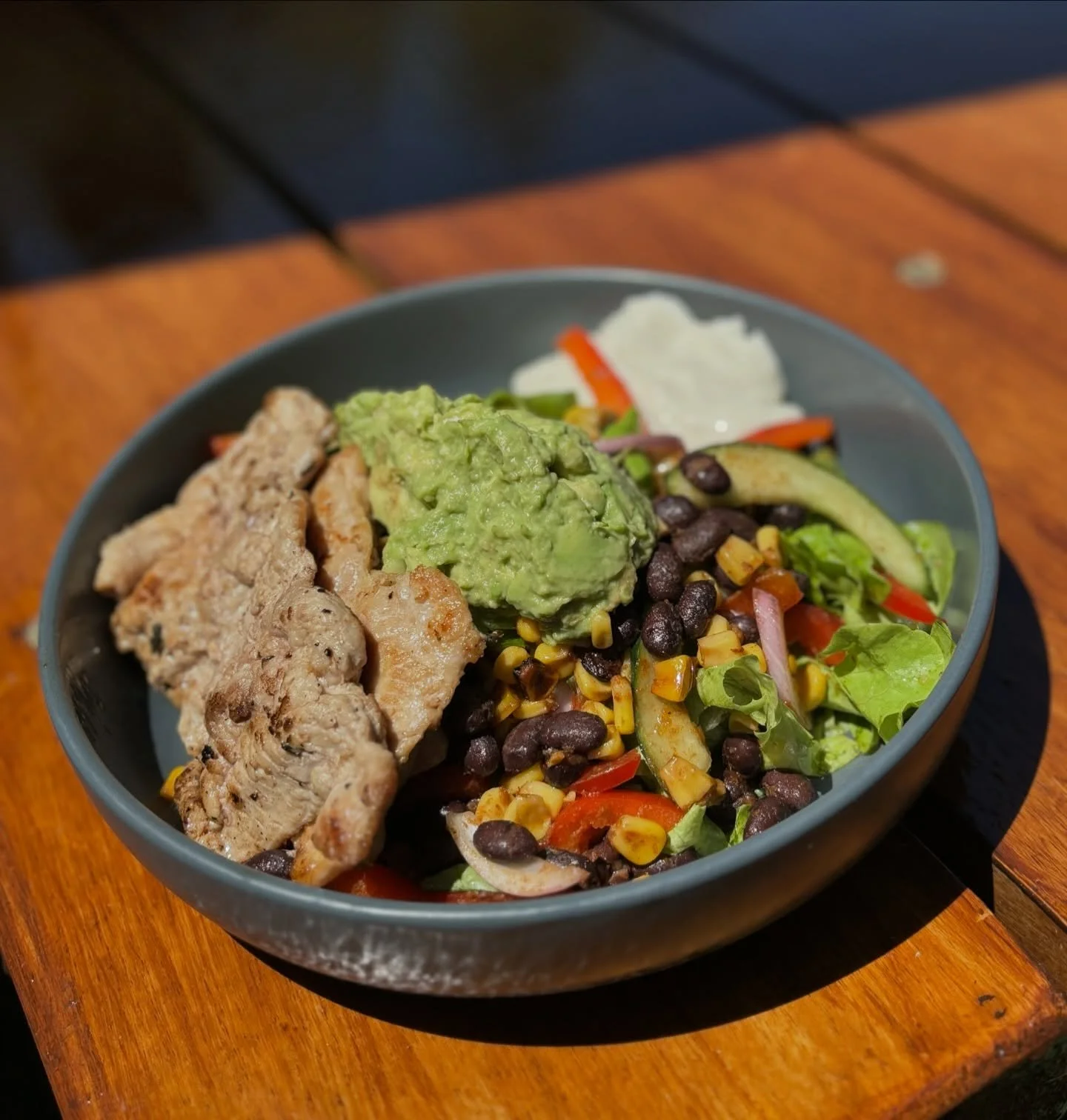 Weekend special just landed: our roasted corn &amp; bean salad with crisp oak lettuce, avo, sour cream and grilled chicken. Fresh, colourful, and ridiculously good. 🌽🥑🔥

#bellingeneats #oldbutterfactorycafe