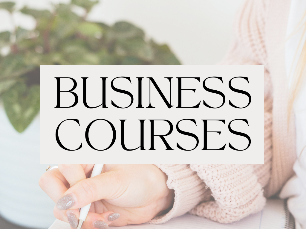 Text overlay on image reading 'Business Courses' held in front of a person with a pastel pink sweater, with green foliage in the background.