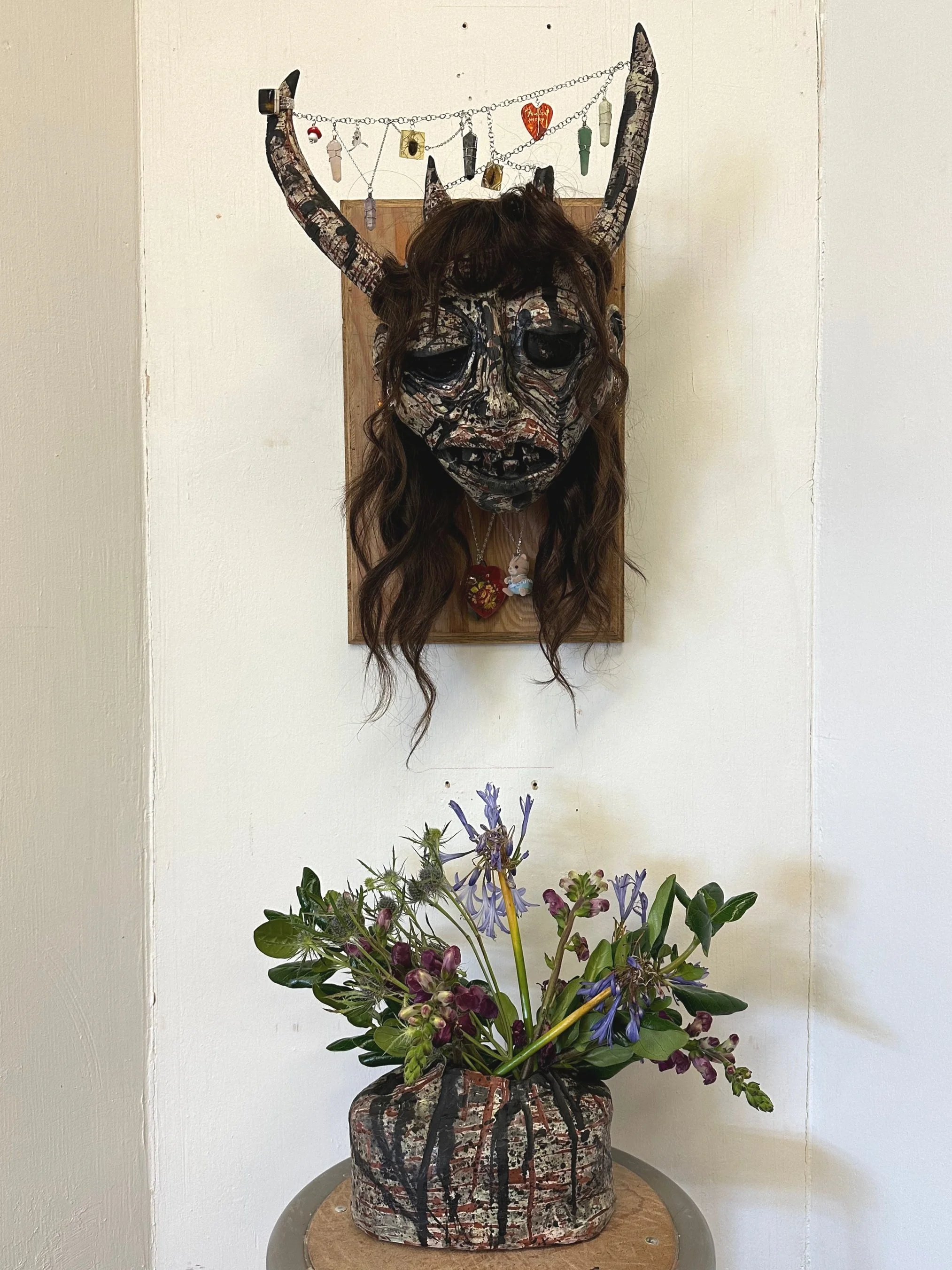 ME on a wall
hand built ceramic, wood, hair, trinkets, flowers, and wire
April 30, 2023