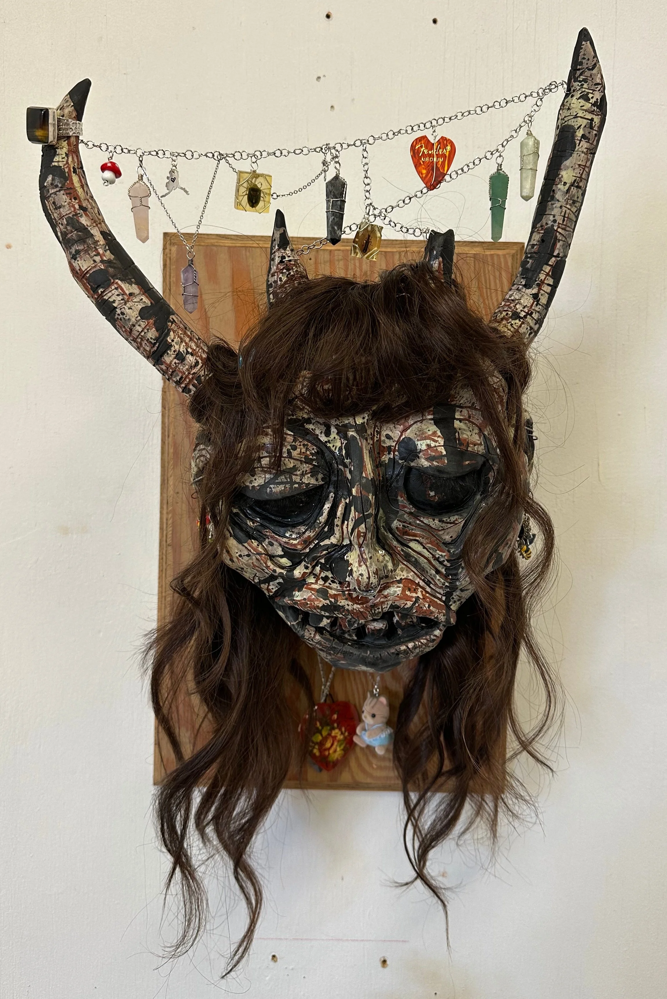 ME on a wall
hand built ceramic, wood, hair, trinkets, flowers, and wire
April 30, 2023