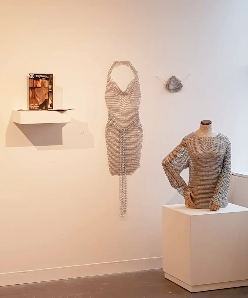 "Maille Order", aluminium chain maille garments. On display at CraftACT's "Emerging Contemporaries 2021" exhibition.