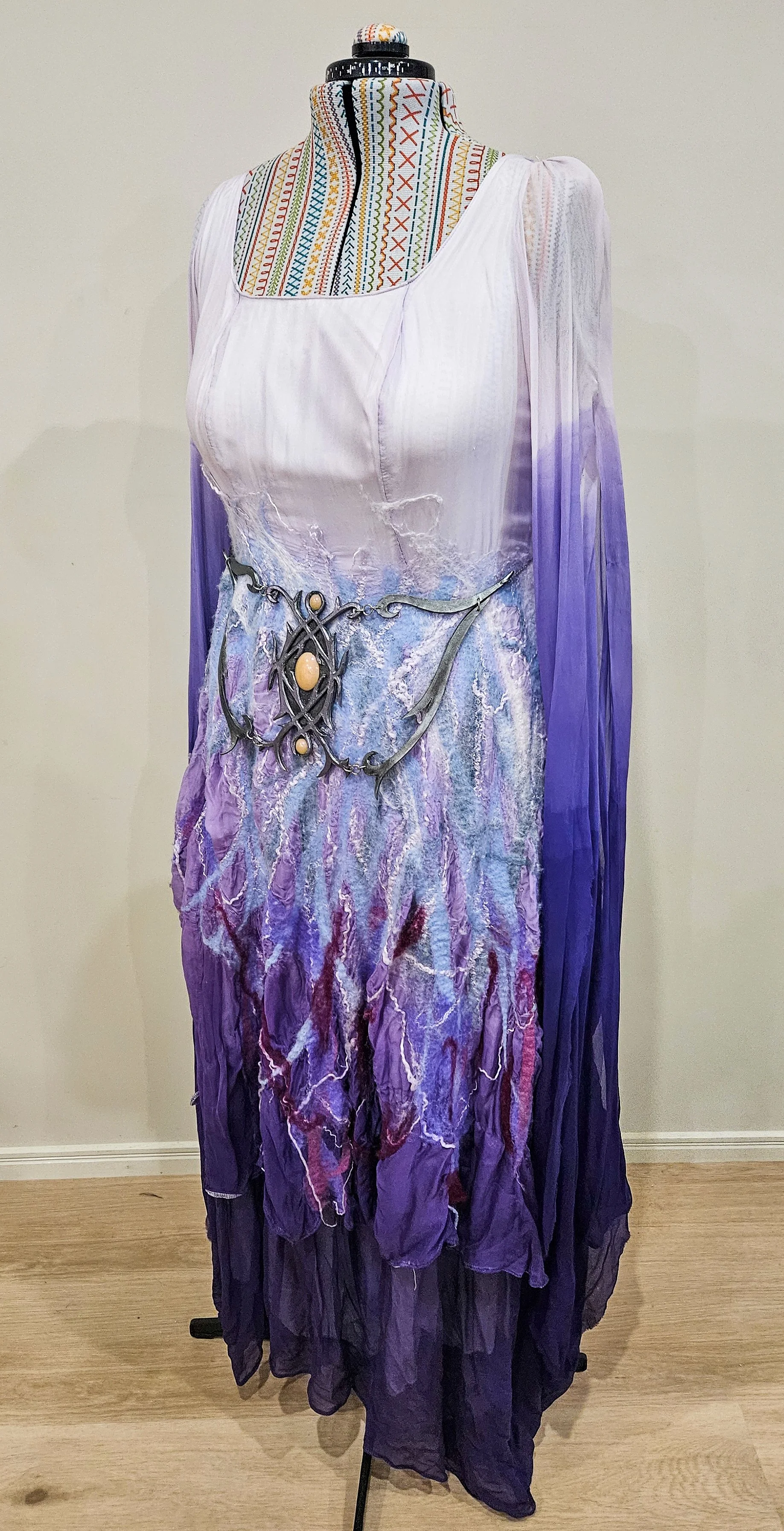 "Winter's Bride" dress, 2019. Wool and silk fibre, wet felted onto dip-dyed silk chiffon, with carved leather and resin belt.
