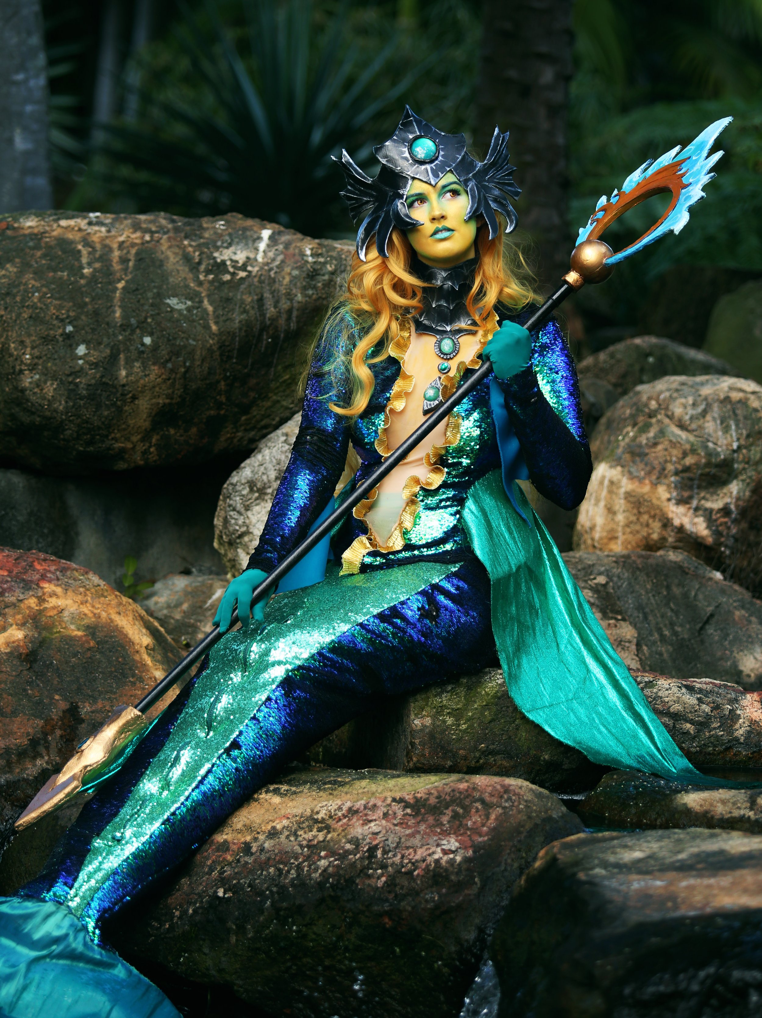 Nami - League of Legends
(2016)

Constructed with EVA foam, thermoplastic, resin, fabric. A zipper was sewn into the tail to allow it to convert into a skirt when in transit.

Photo: Blondiee