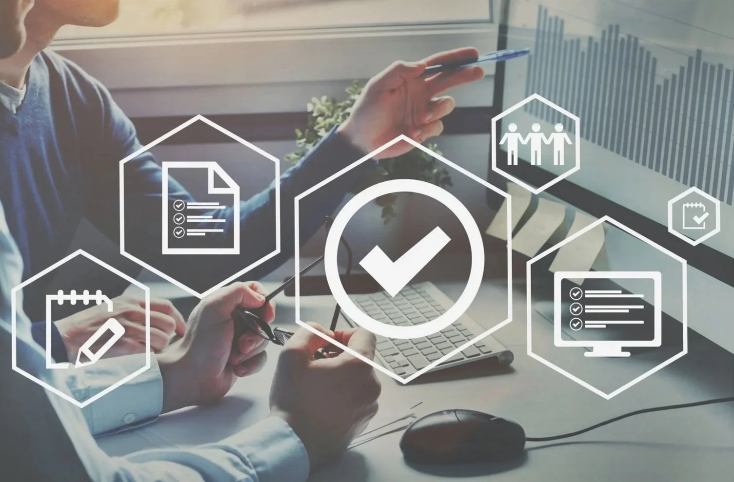 Engineers reviewing quality documentation and digital checklists on a laptop.