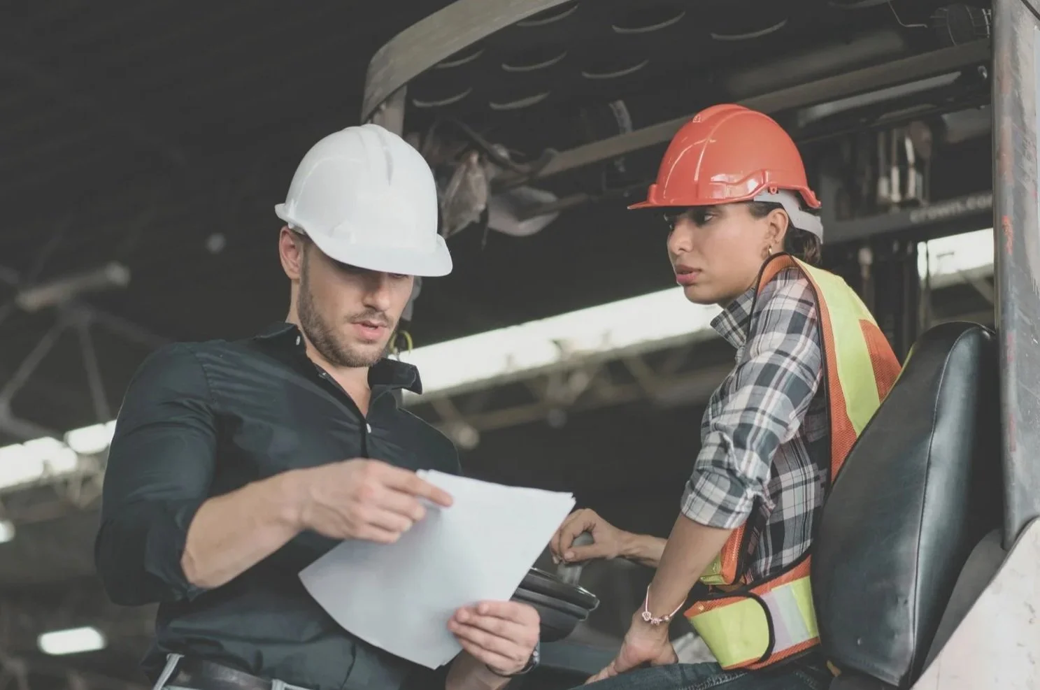 Inspectors reviewing documentation on-site, representing vendor audits and third-party quality surveillance.