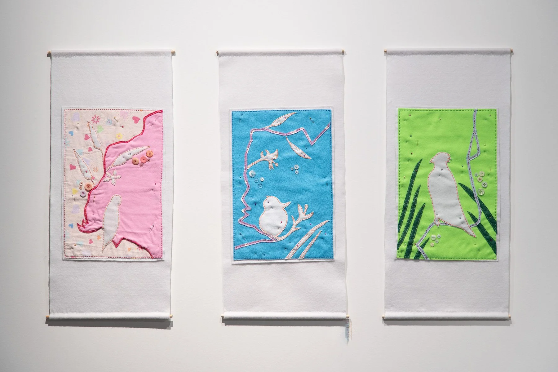 Experiencing Tikilara
Tammy Wong Hulbert
2024-5
Embroidery, felt, flannel and dowel.
Experiencing Tikilara is my creative response to the three days of our walking residency. During my upbringing, Chinese arts and crafts played an important role i