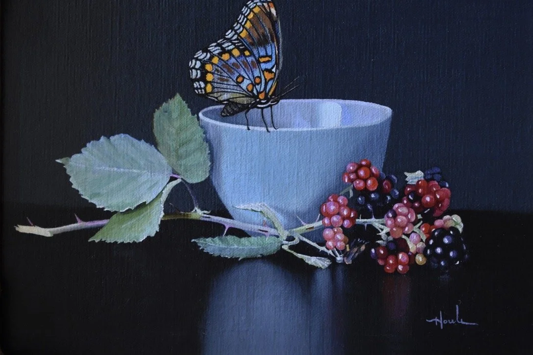 Painting of a butterfly on a white cup, with green leaves and red and blackberries on a black background.