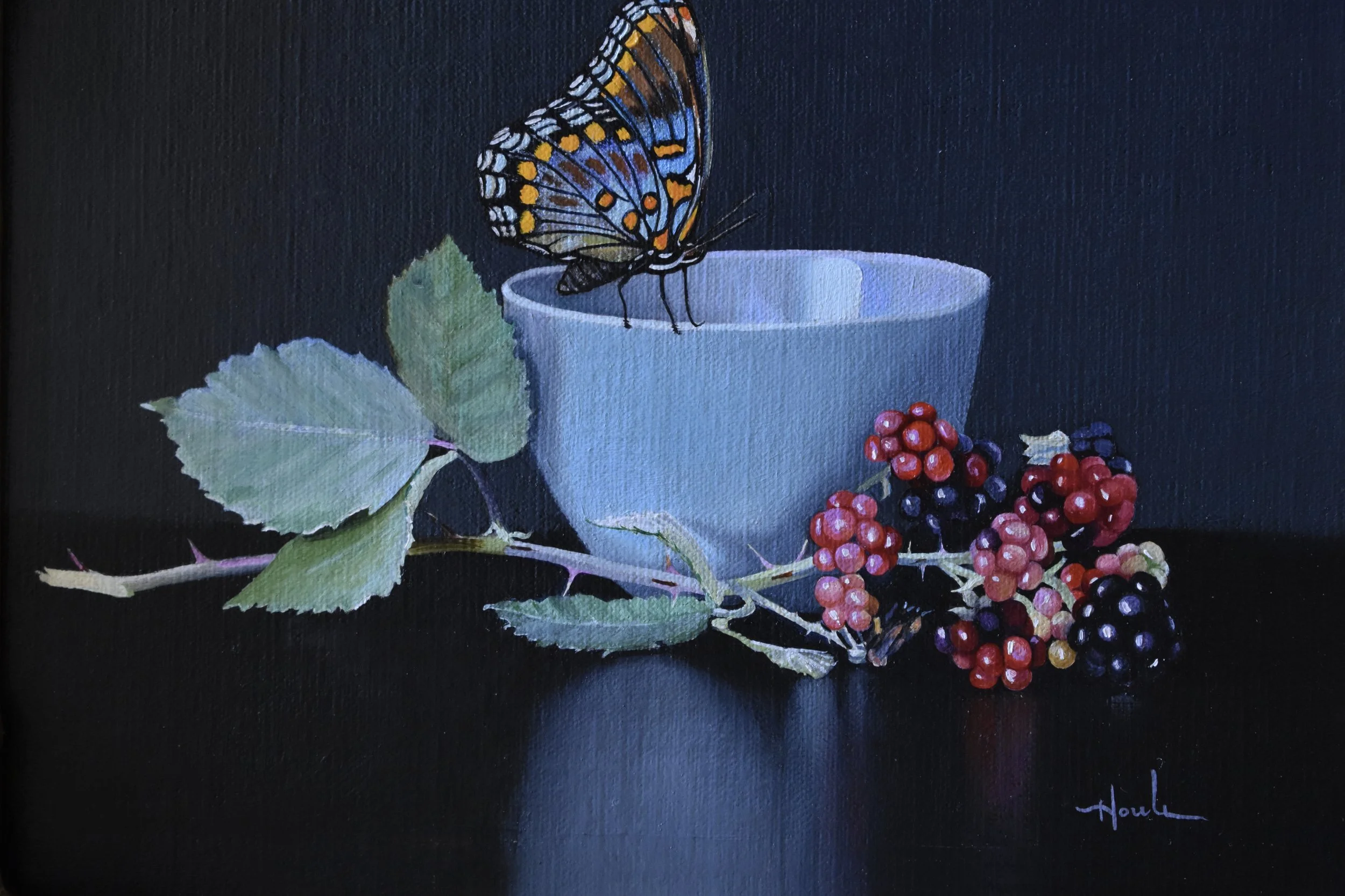 Painting of a butterfly on a blue cup, with red and black berries, a green leaf, and the artist's signature on a dark background.