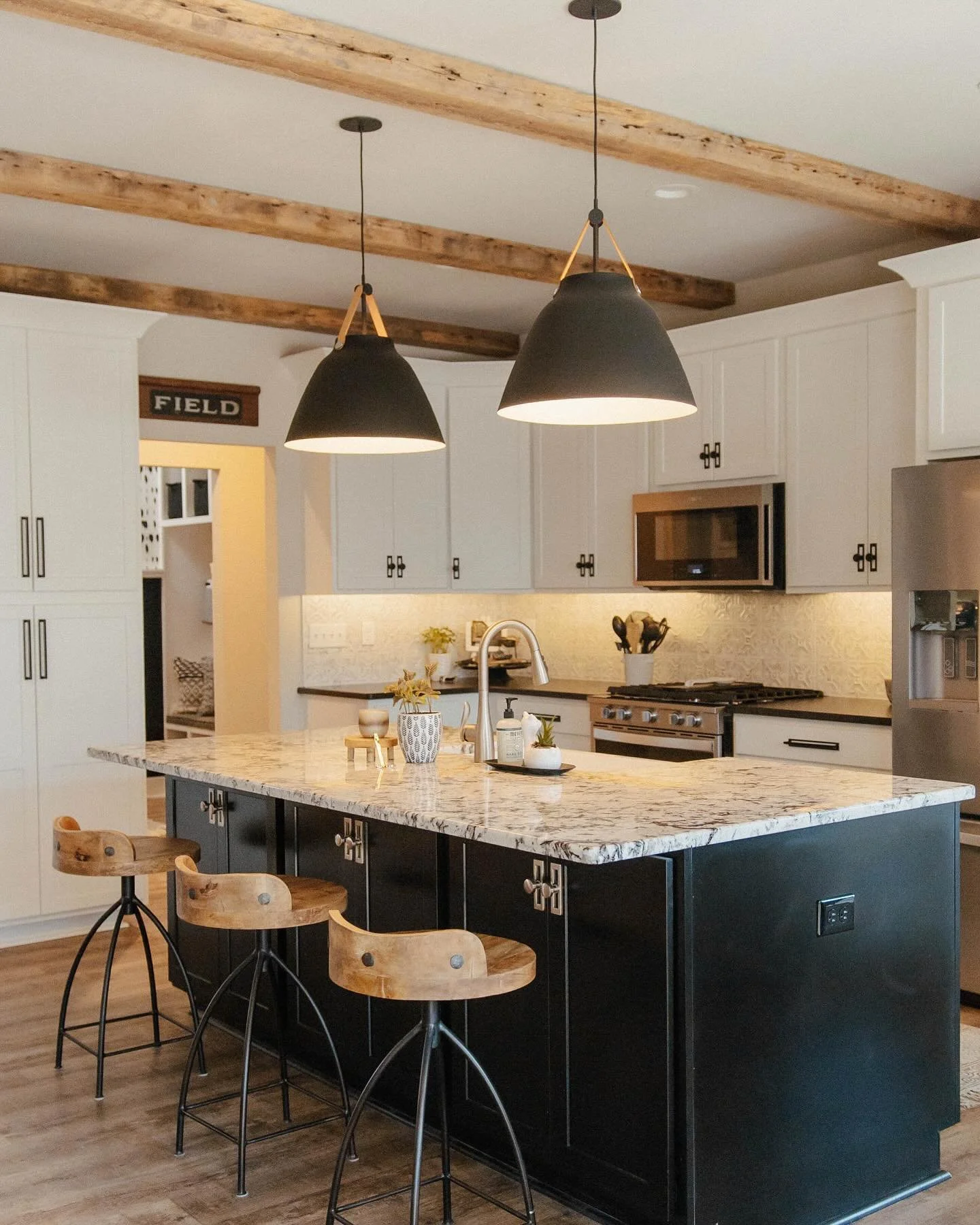 The heart of the home shines brighter during Thanksgiving week! This warm and inviting kitchen is ready for delicious meals, shared laughter, and cherished memories. From the natural wood accents to the timeless design, this space was made for celebr