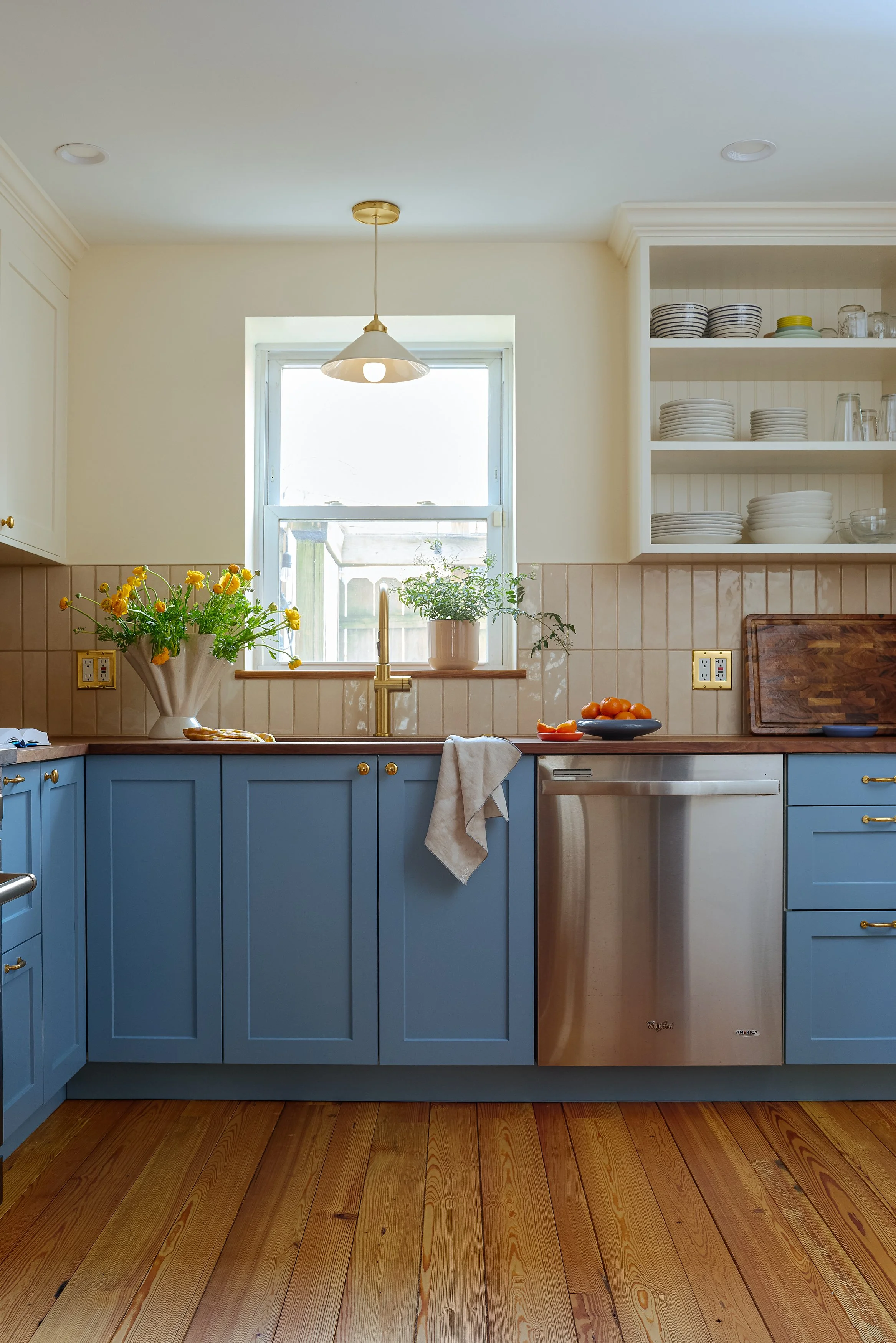 reclaimed wood flooring with custom black walnut countertops 