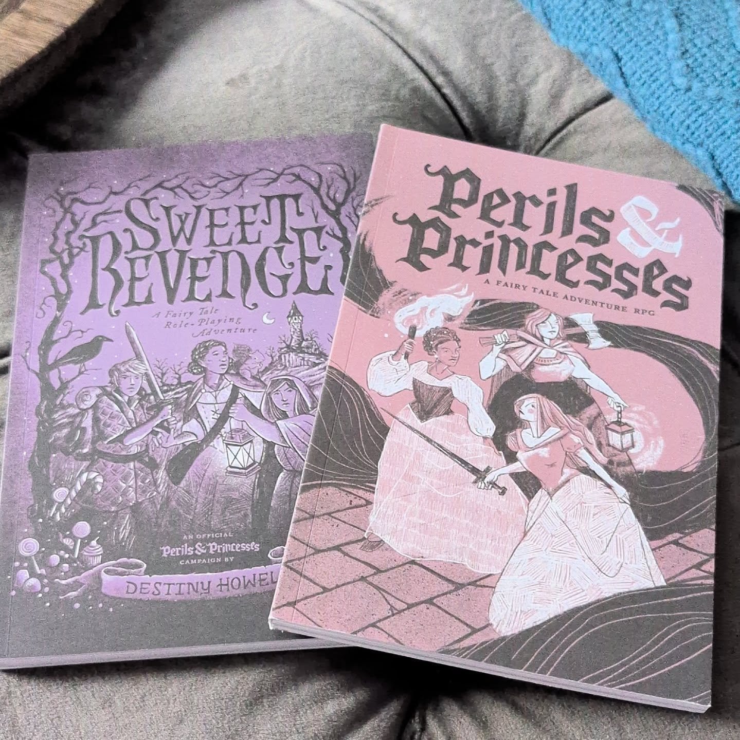 AND THESE FINALLY CAME! I've been pouring over the PDFs but oh man do these babies feel so good in my hands. Now to put the finishing touches on my whimsical, royal, badass princess adventure. 

Today's such a good day for games.