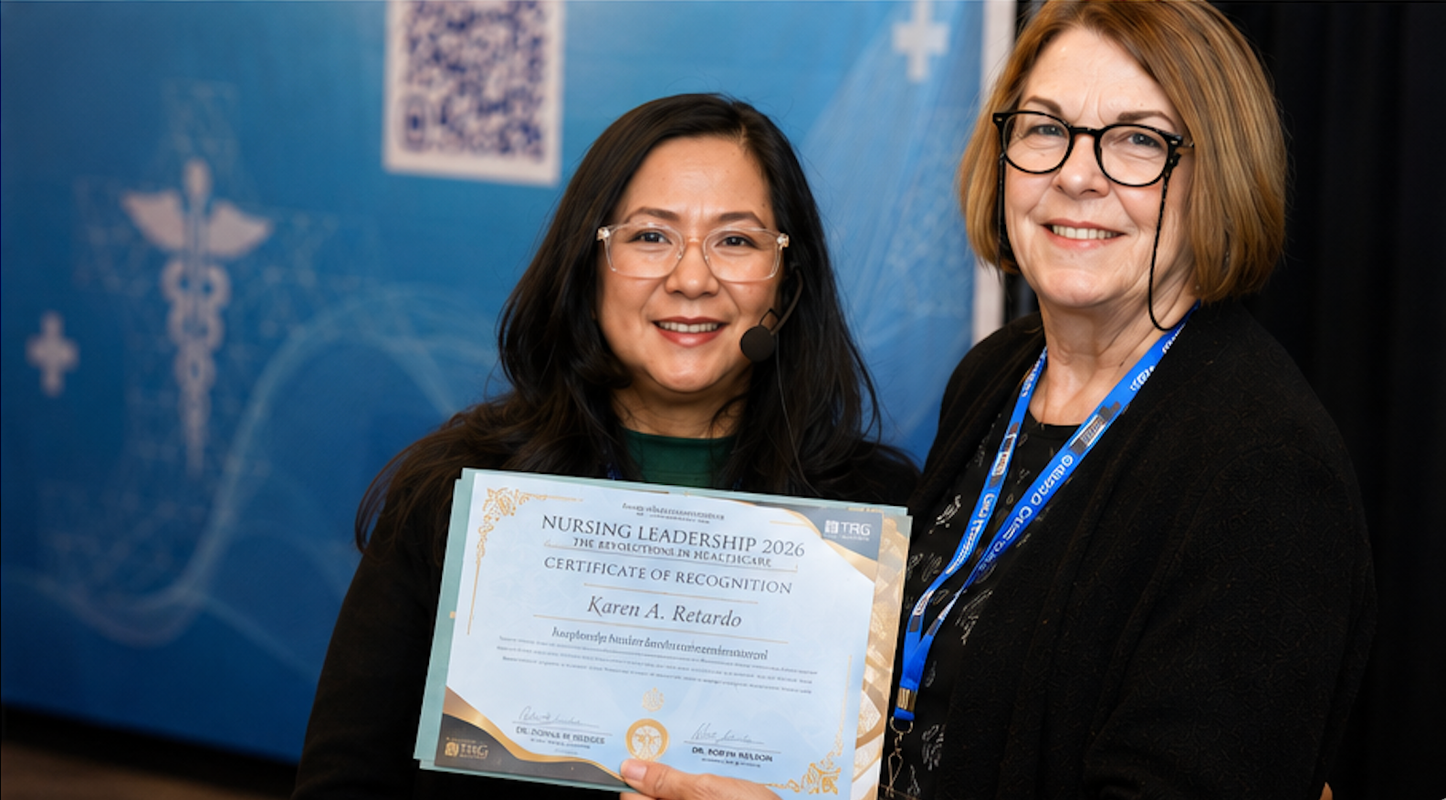Karen receiving a certificate of recognition from the Nursing Leadership 2026 event.