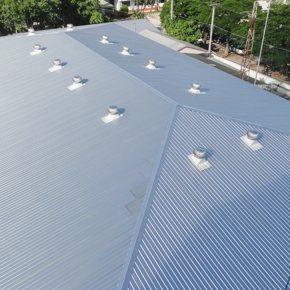 Commercial metal roof after restoration coating in Indiana