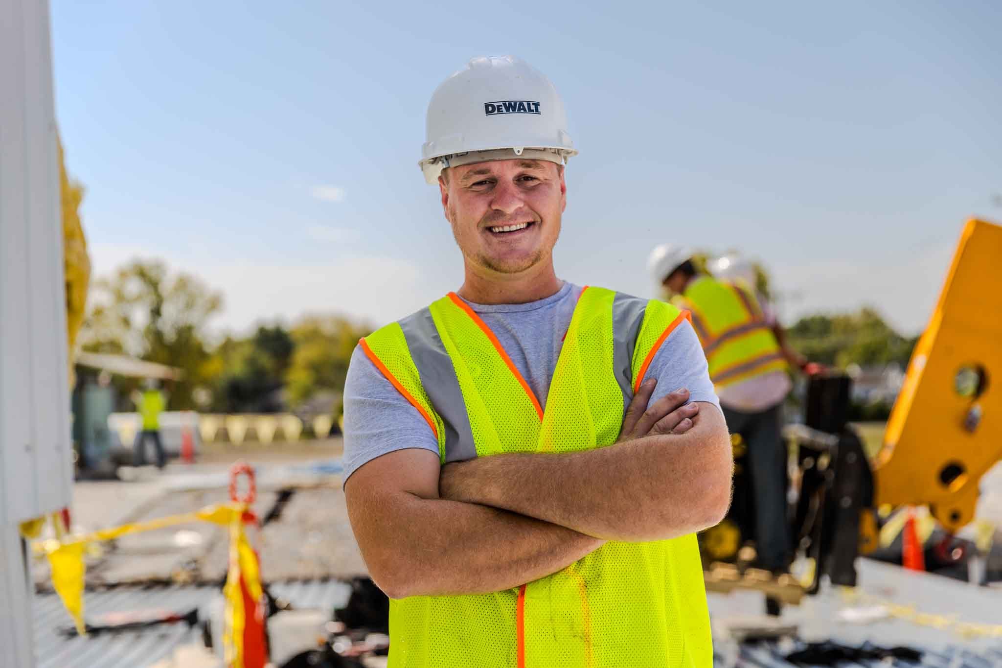 Commercial roofing company owner overseeing job site in Elkhart area