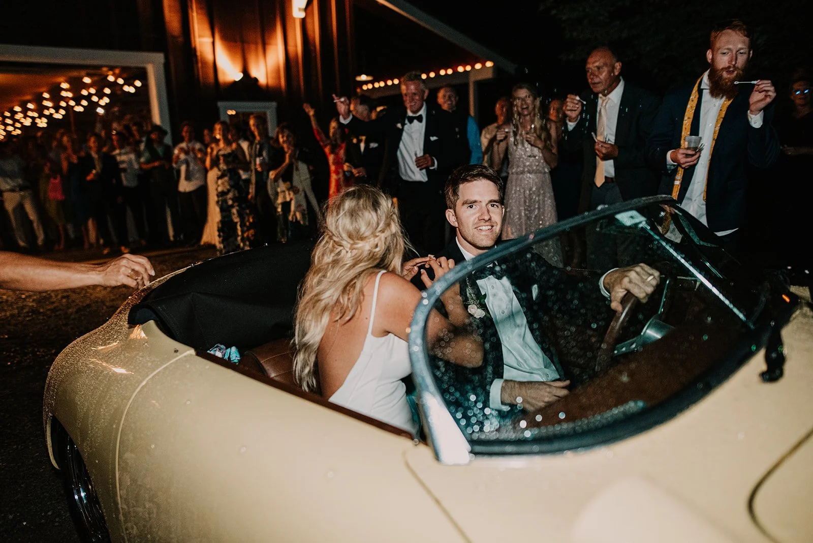 Bride and Groom grand exit in vintage getaway car in Columbia River Gorge.