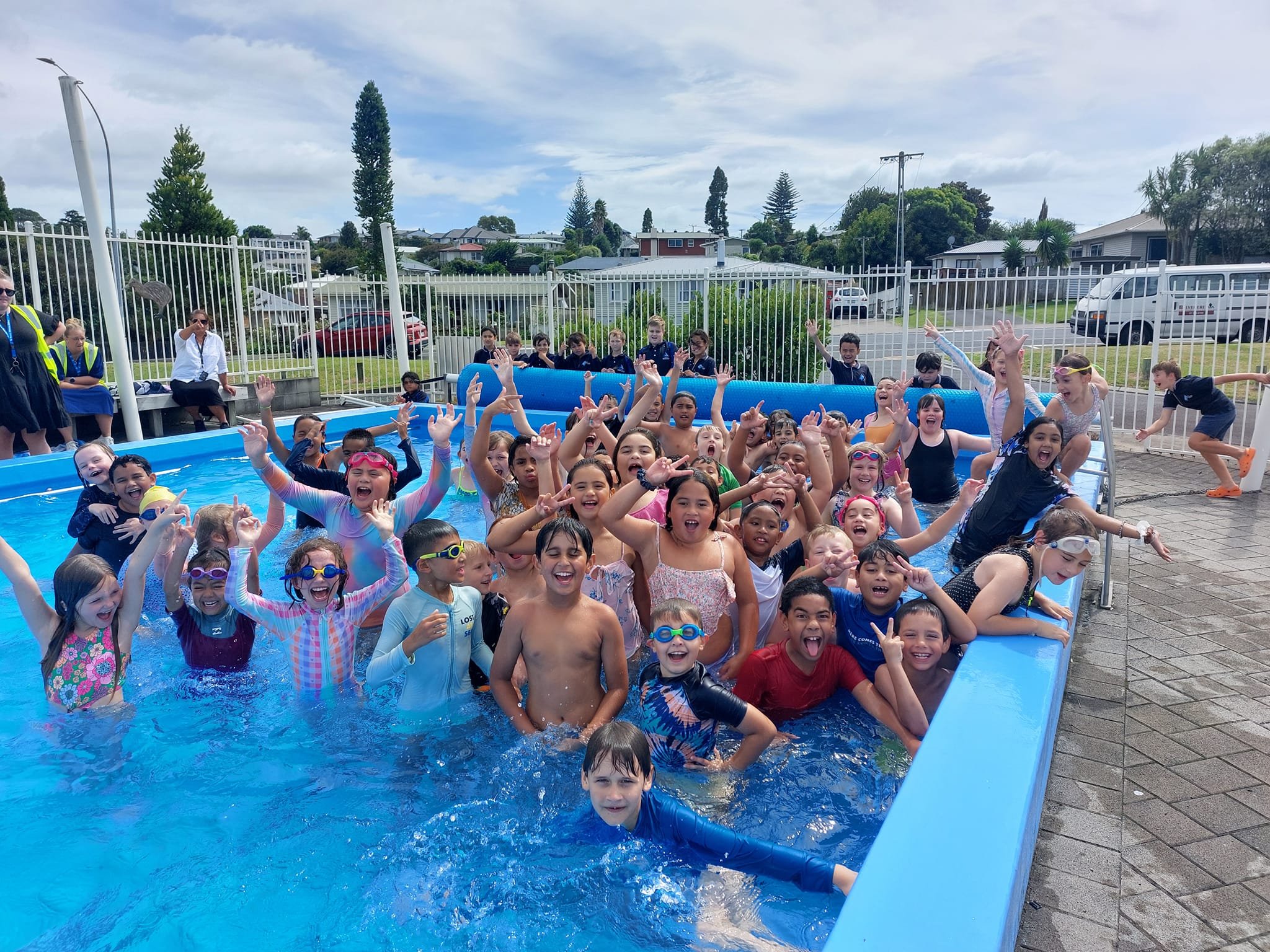 Children having fun in a swimming pool