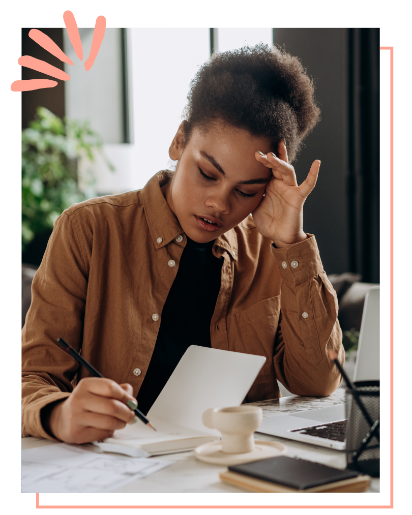 Therapist looking stressed and overwhelmed while working, illustrating the pain point of the traditional therapy model.