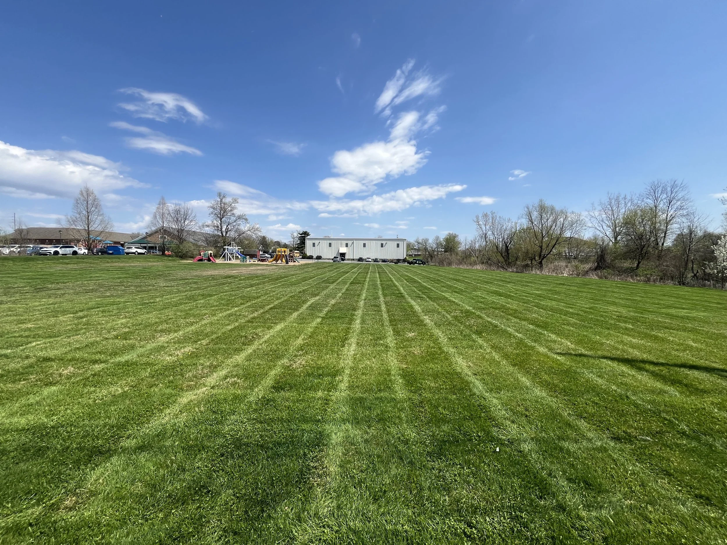 Freshly mowed lawn with alternating stripes in Streetsboro, OH.