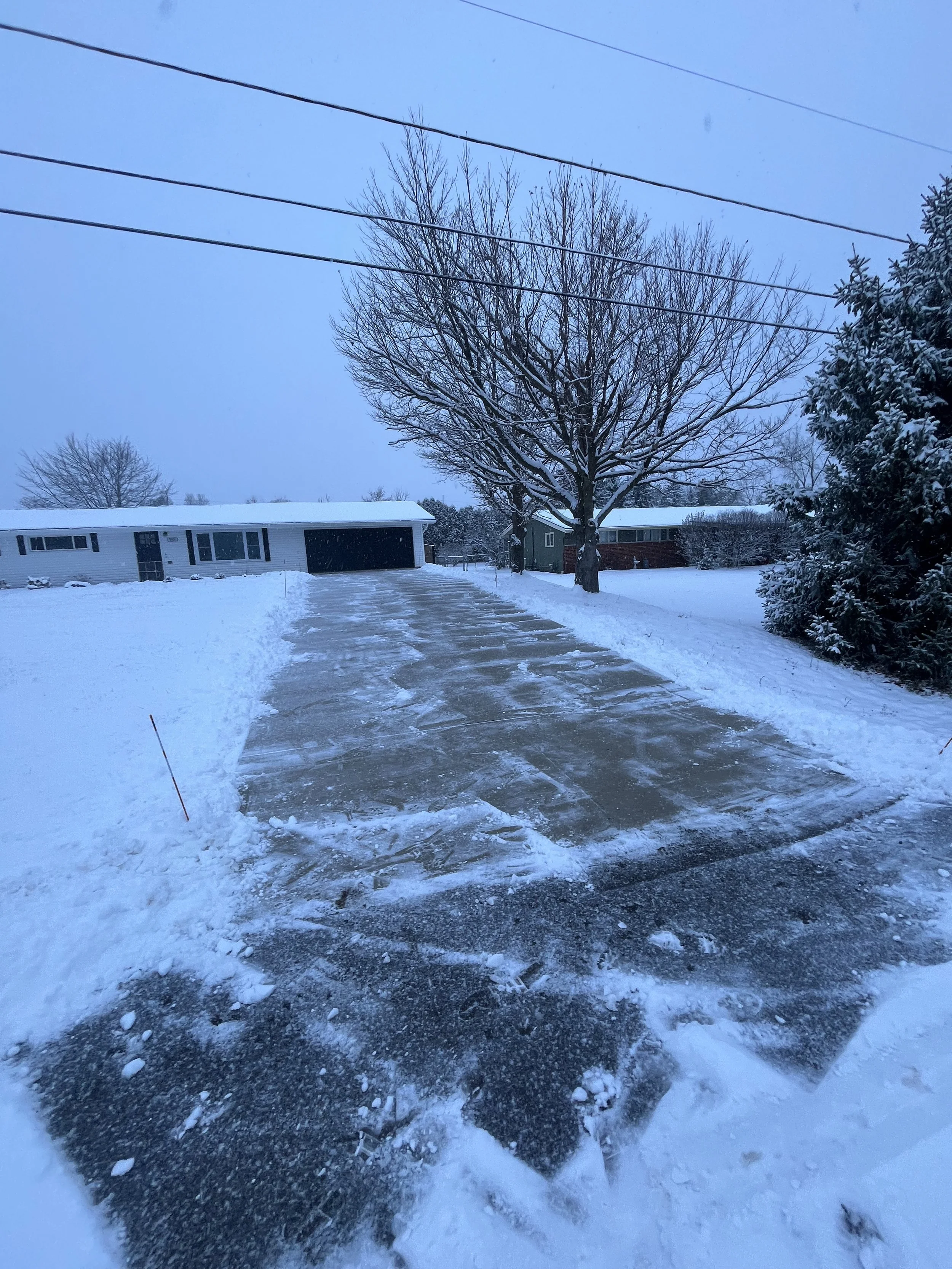 Recently cleared driveway during a snow removal event in Streetsboro, OH.