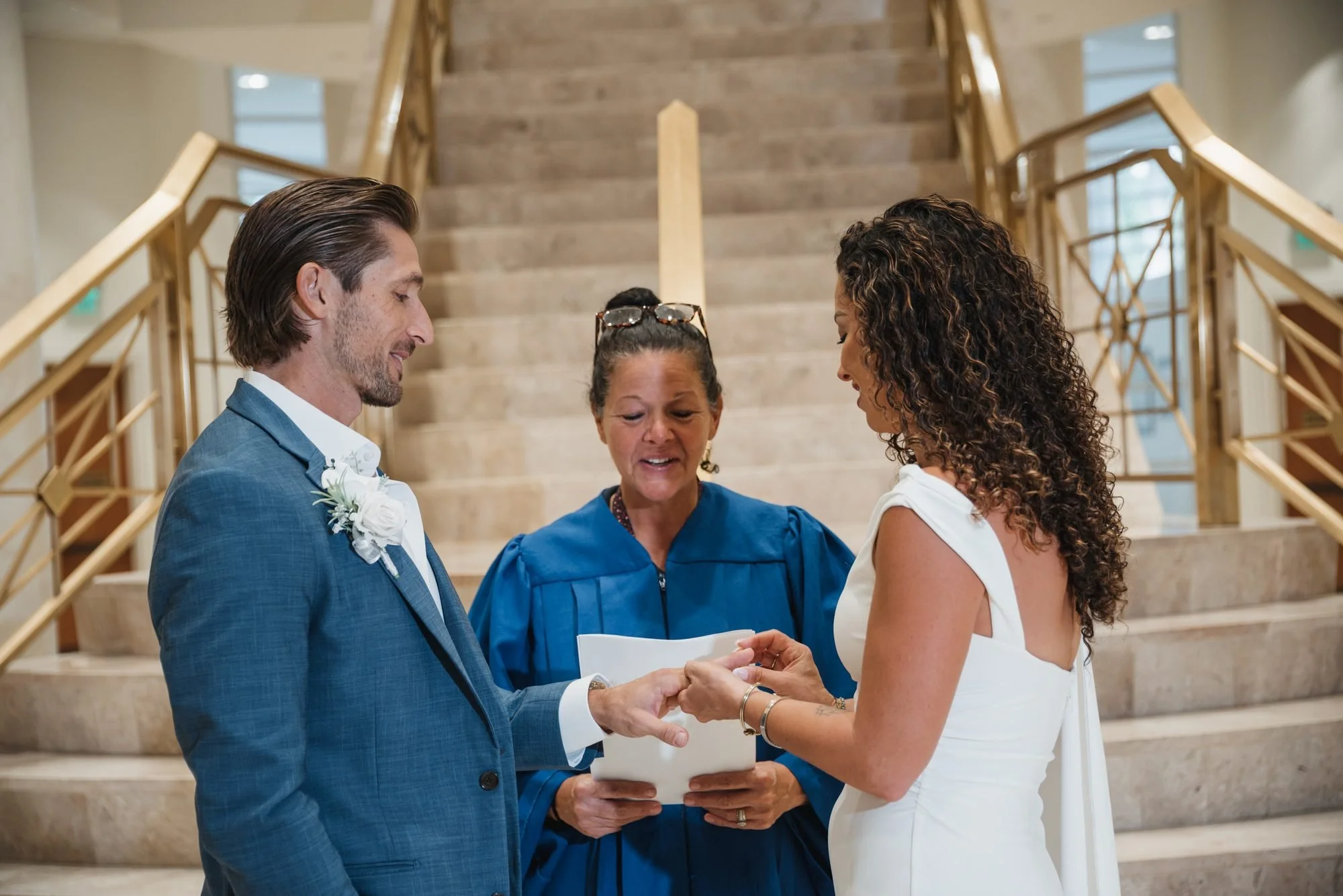 Couple exchanging rings during their ceremony at the Delray Beach courthouse
