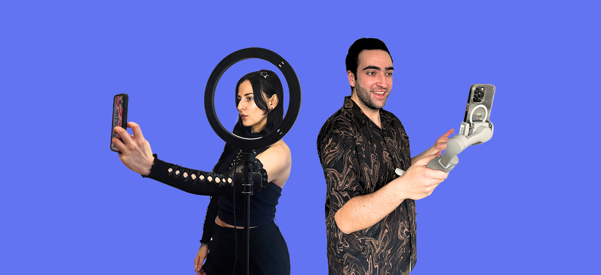 A woman with black hair in a black cut-out top takes a selfie with a smartphone and a man with dark hair in a patterned shirt uses a stabilizer with a smartphone against a blue background.