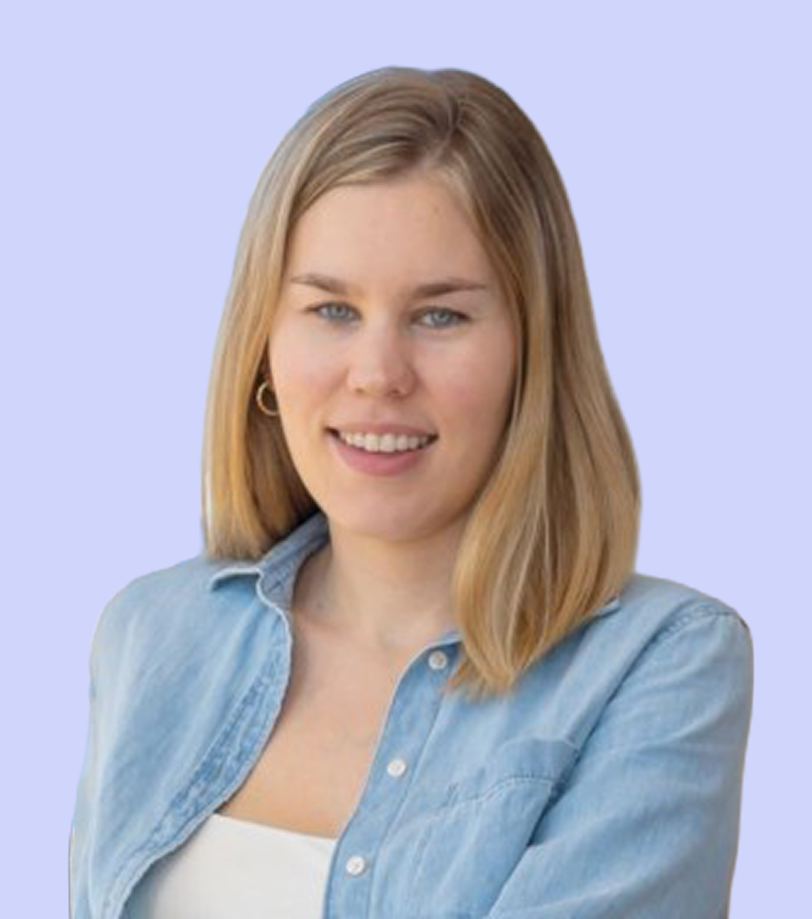 A young woman with shoulder-length blonde hair, blue eyes, and a light blue denim shirt smiling against a light purple background.