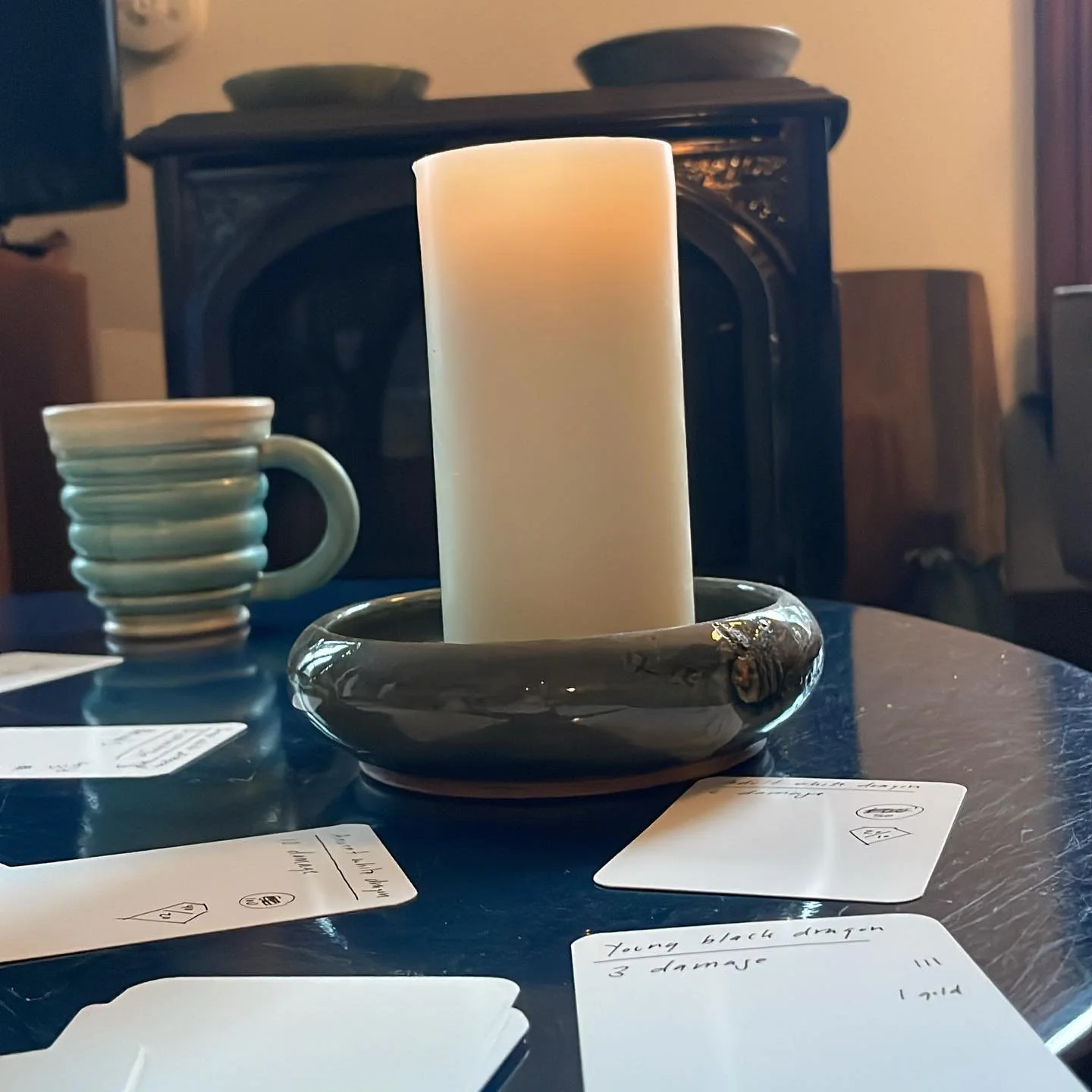 How better to design a game than by candlelight on a rainy day?