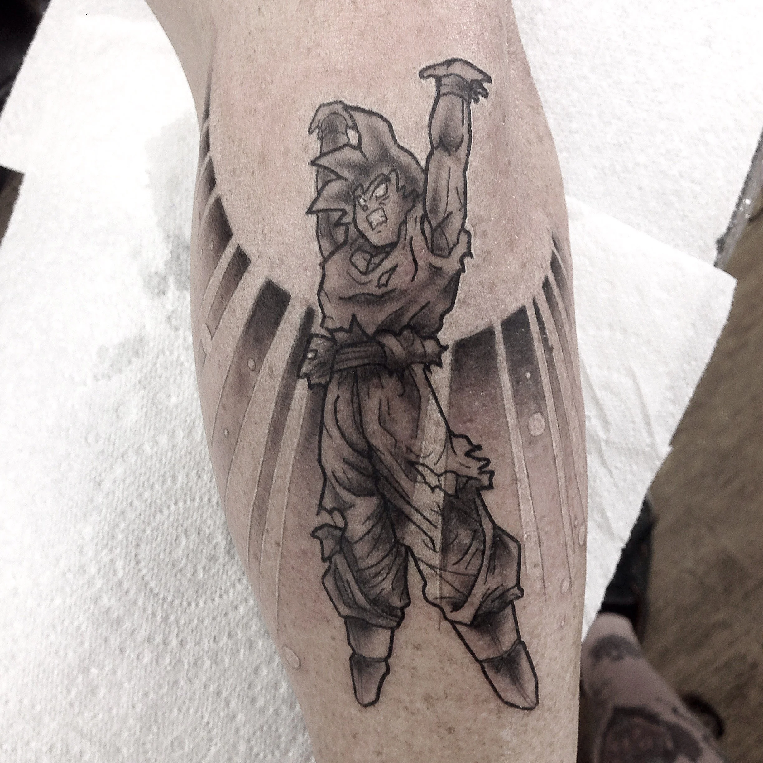 Goku spirit bomb tattoo brisbane pop culture gaming brisbane best anime manga tattoos artist