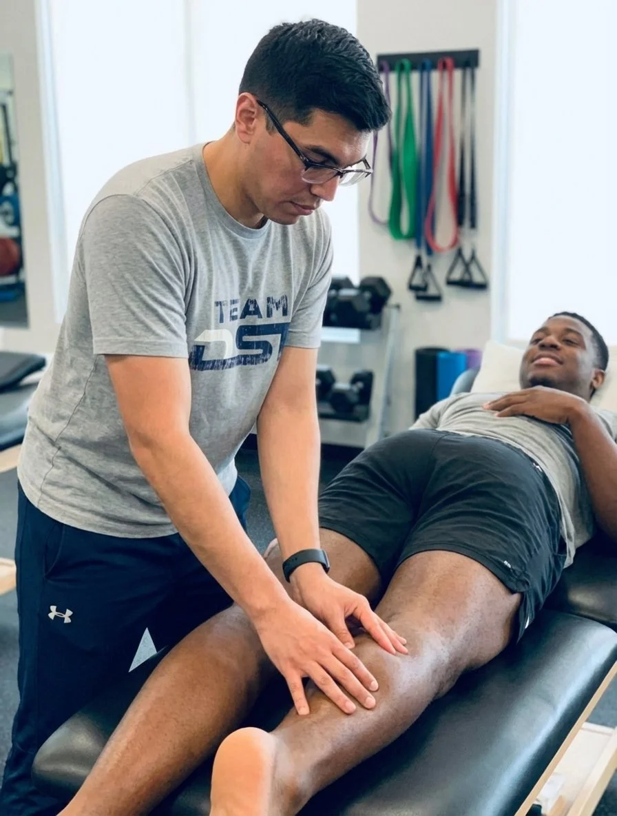 Patient working with a provider at a performance training clinic in Tomball