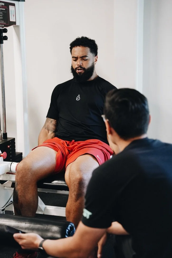 Athlete performing knee rehab in physical therapy Tomball Tx