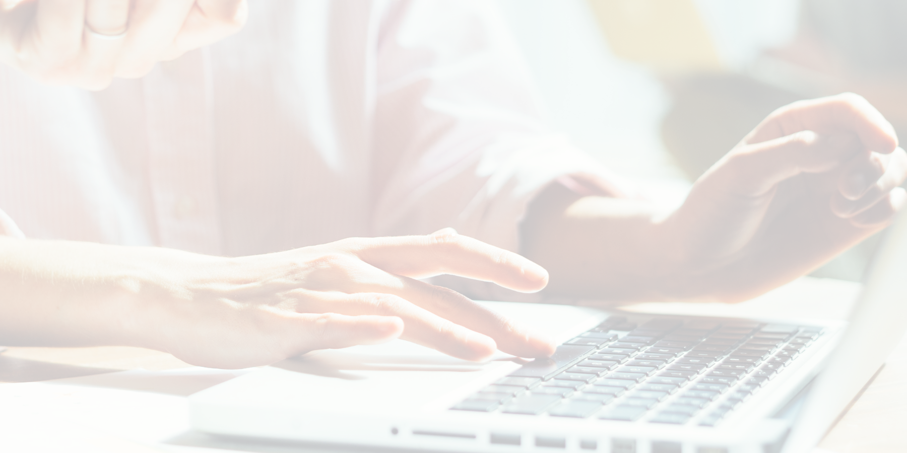 Business owner reviewing bookkeeping records on a laptop while catching up on financial accounts.