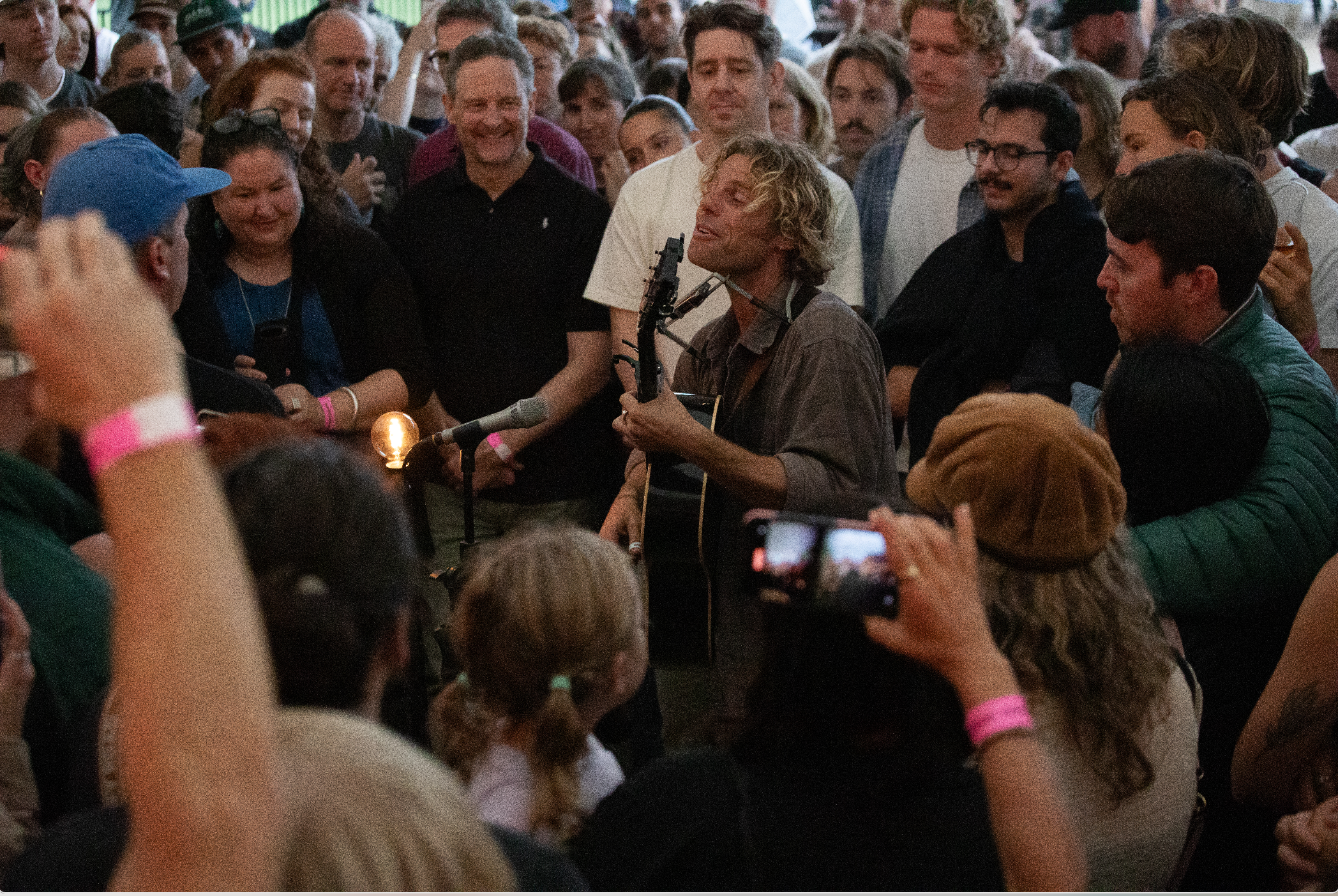 Kim Churchill candle lit live performance of
"busking song" in the crowd