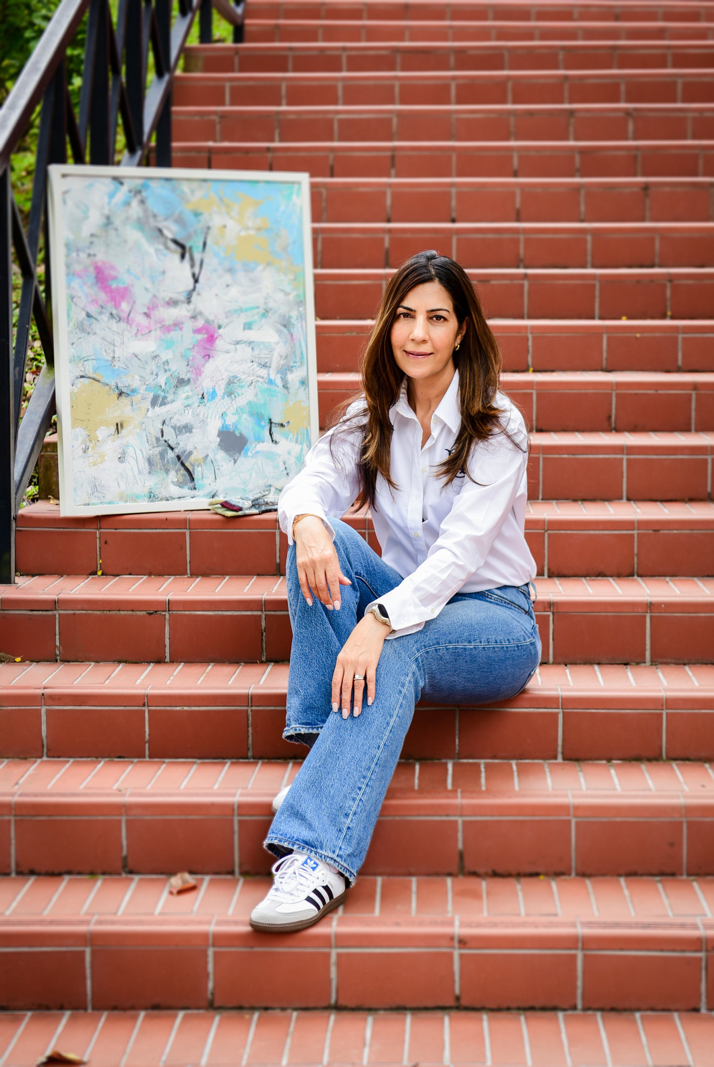 Canvas Connections artist Seema Ahuja with her artwork