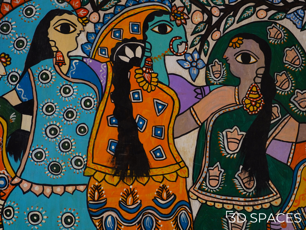 Traditional Madhubani wall painting featuring Indian women in colorful sarees with intricate folk art patterns and vibrant cultural artwork.