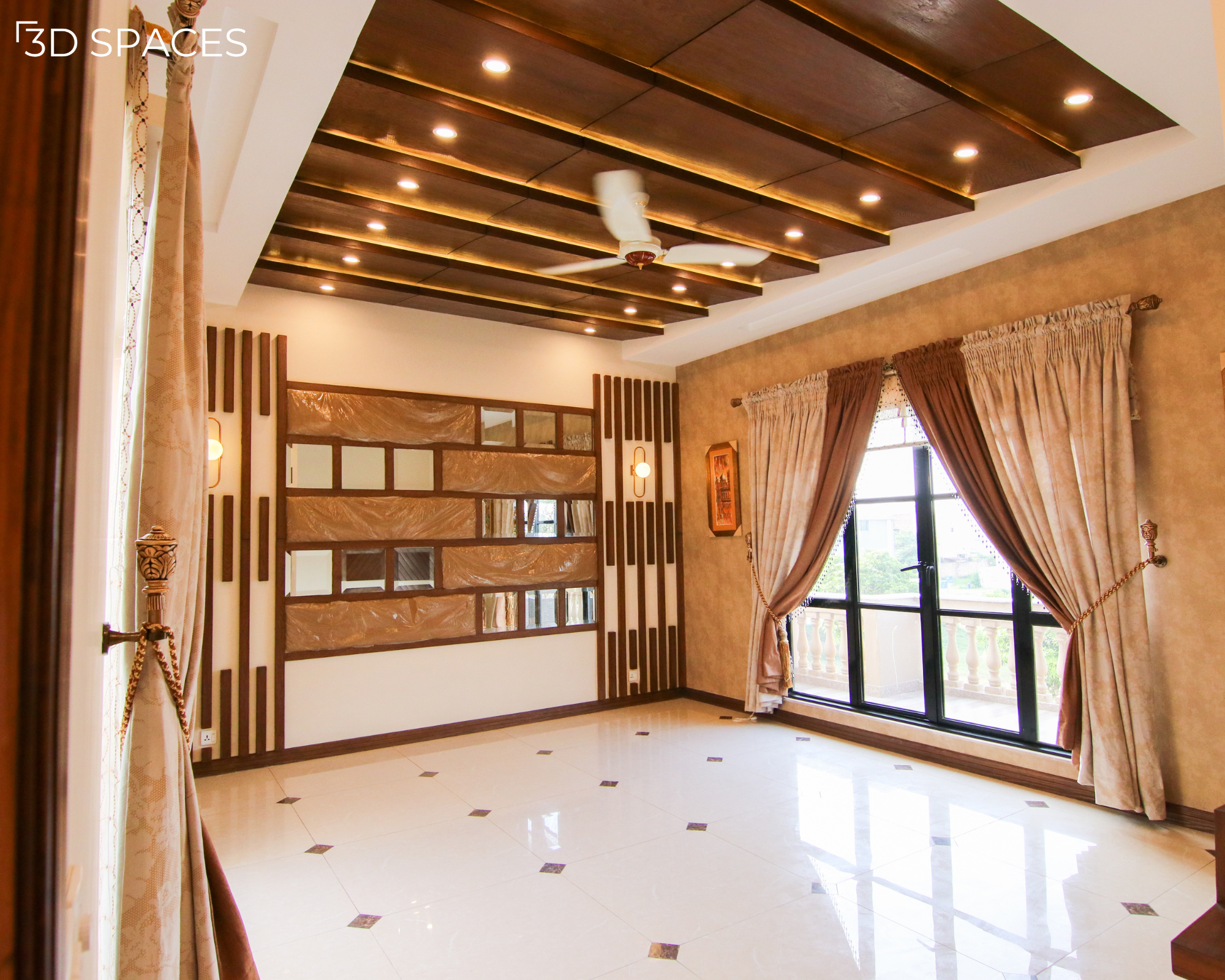 Modern wooden false ceiling design with multiple rows of recessed spotlights and a white ceiling fan in a living room.