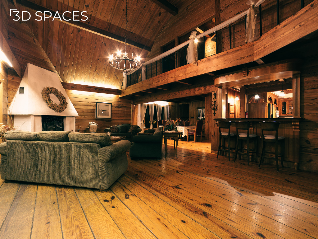 Luxury wooden living room interior with vaulted timber ceiling, exposed wooden beams, fireplace, and rustic cabin home design.