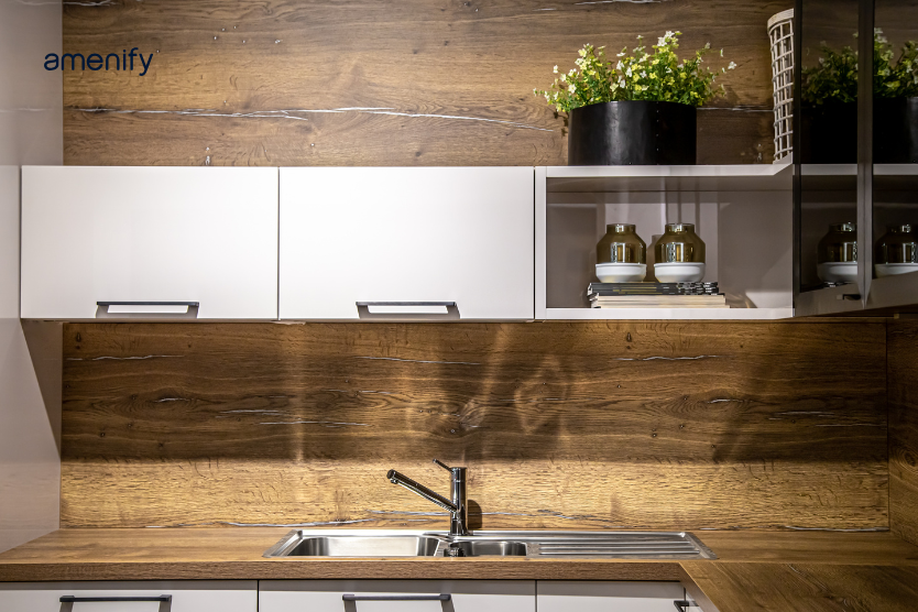 close-up of premium gold hardware on bespoke luxury kitchen cabinets