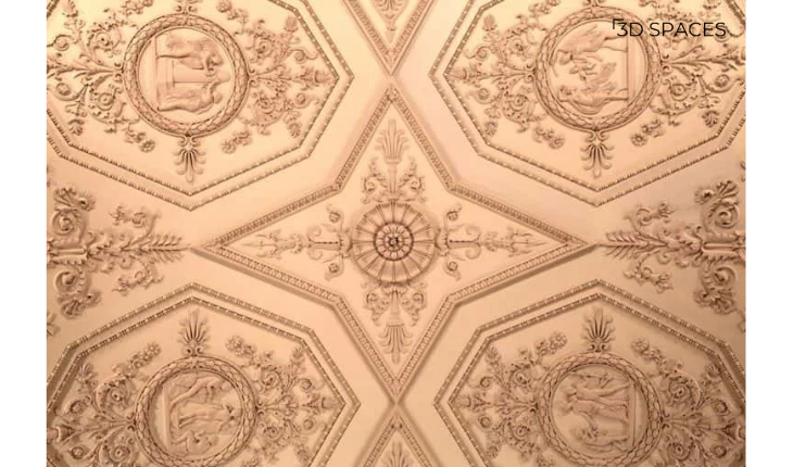 Elaborate cement ceiling design showcasing intricate carvings for a regal and sophisticated look.