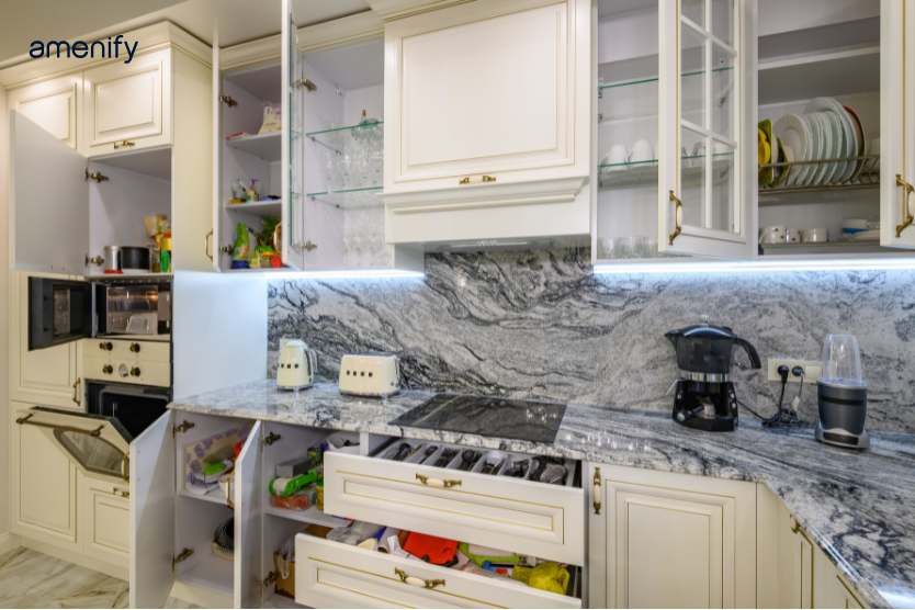 luxury kitchen cabinets integrated with seamless marble countertops and backsplash