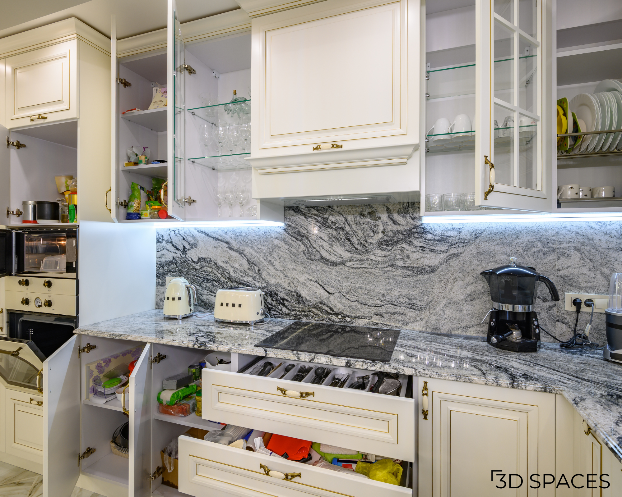 luxury kitchen cabinets integrated with seamless marble countertops and backsplash