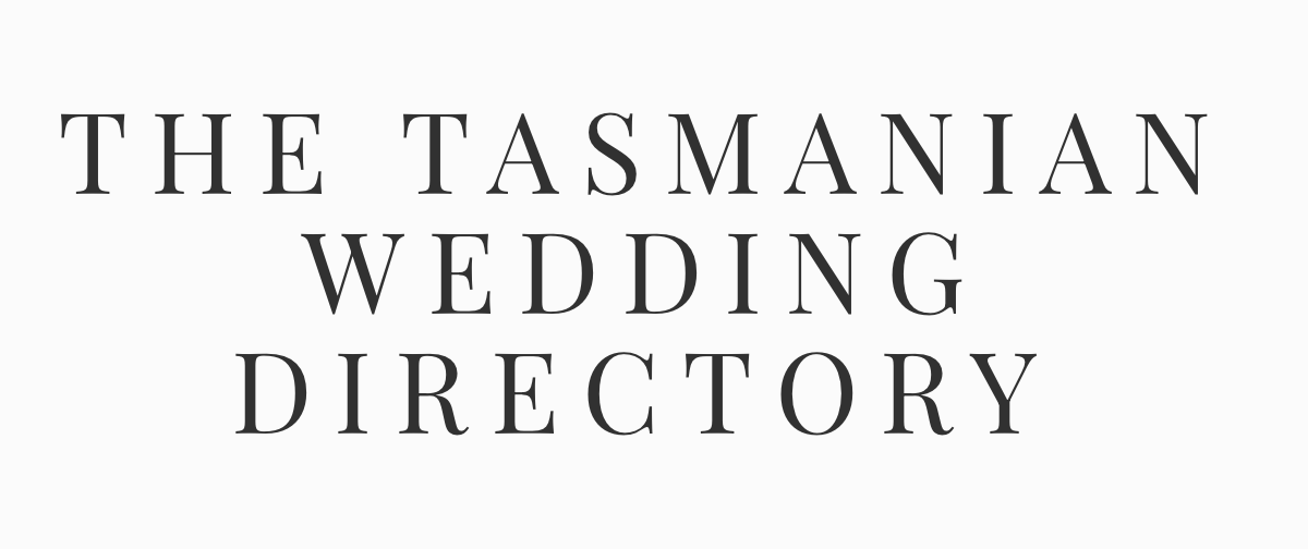 Text that reads "The Tasmanian Wedding Directory" in black capital letters on a white background.