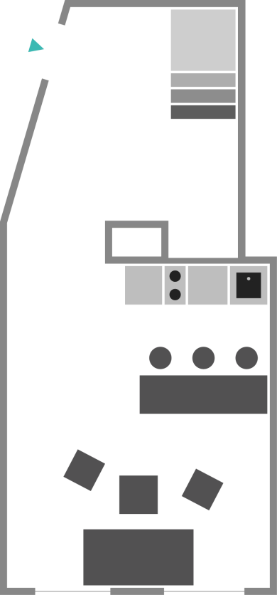 Grundriss eines kleinen Apartments mit Küche, Essbereich, Schlafzimmer und Badezimmer.