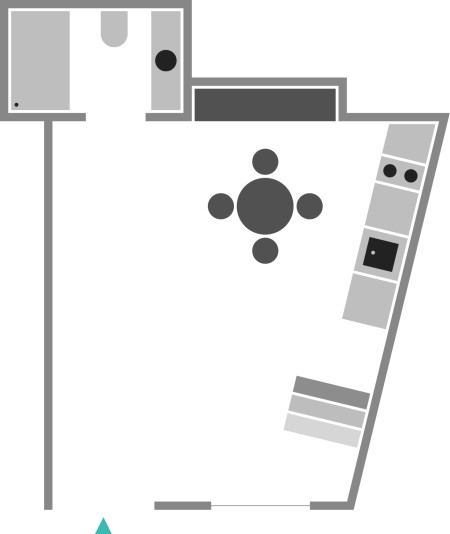 Floor plan of a small apartment with a bedroom, bathroom, dining area, and kitchen.