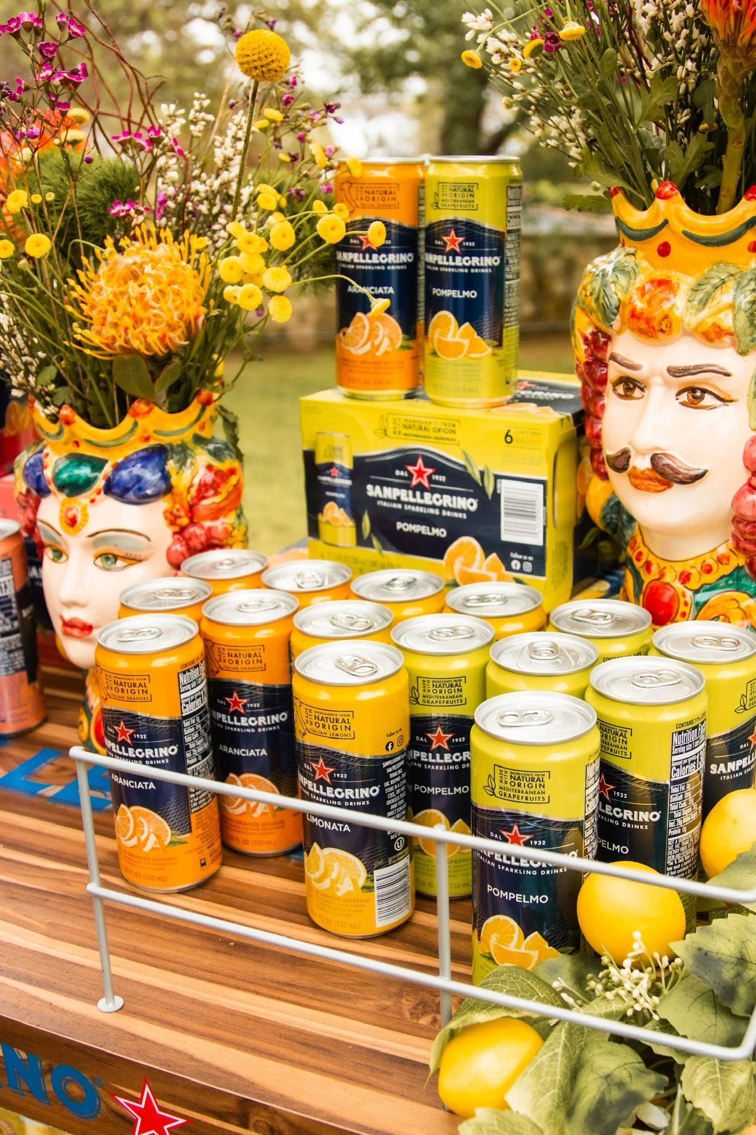 San Pellegrino sparkling drink cans merchandised on a styled Italian market display at the SXSW activation