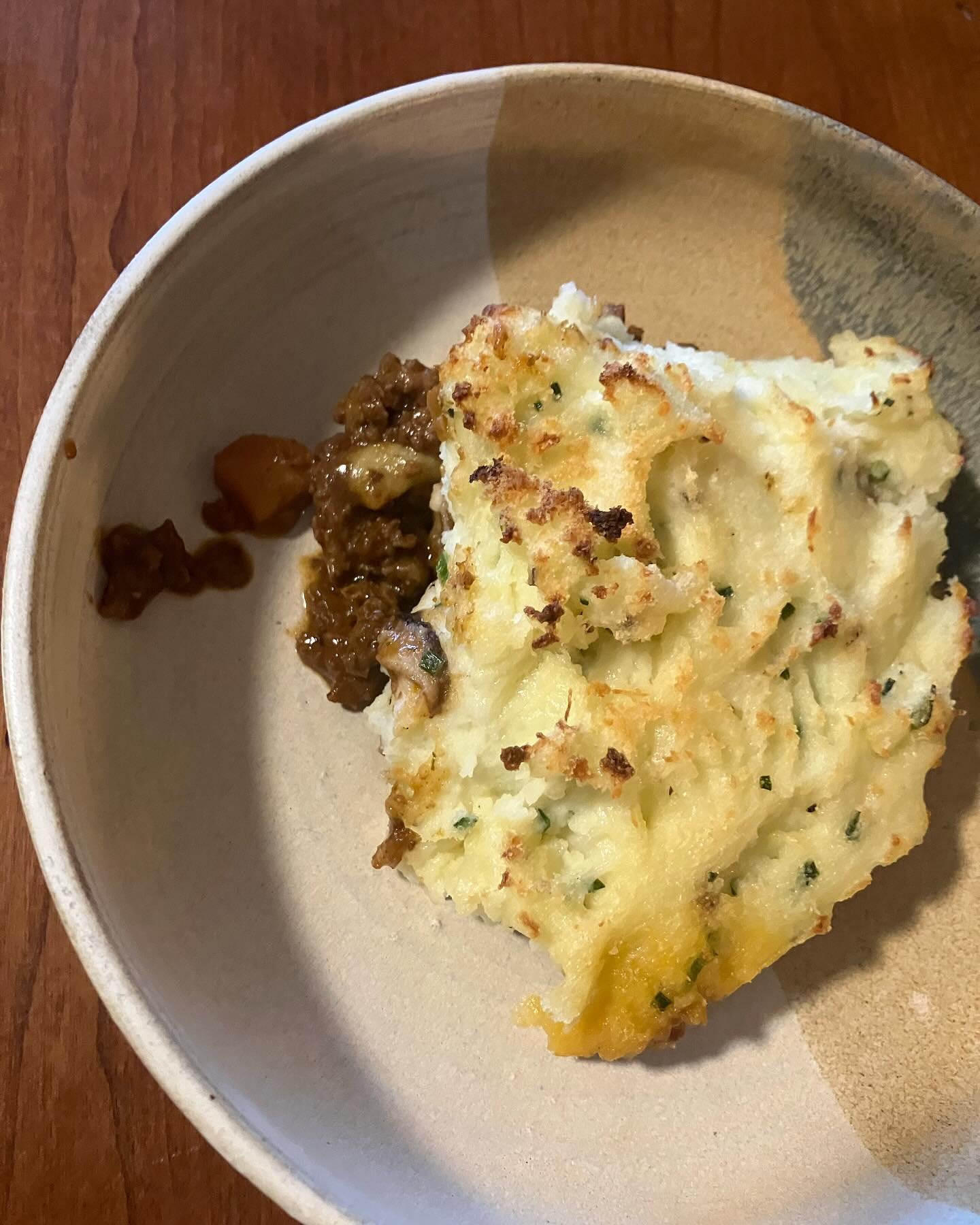 Butterpat Estee makes a perfect Shepherds Pie vessel.  @popsoldplace ground beef, @williwawfarm carrots, @round_stone_farm_ green beans all cooked together in a miso meat sauce with @sanjtamari tamari, hatcho miso, mirin, some chicken jus from freeze