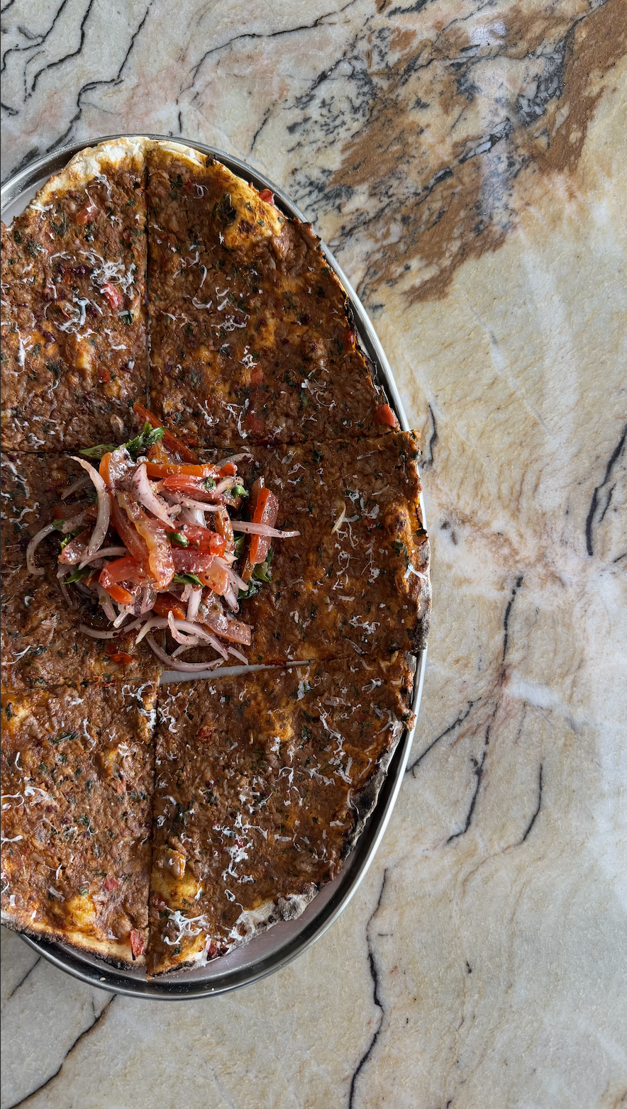 Nan-e goost  / spiced lamb & beef, tomato & herb flatbread / 46 AED
